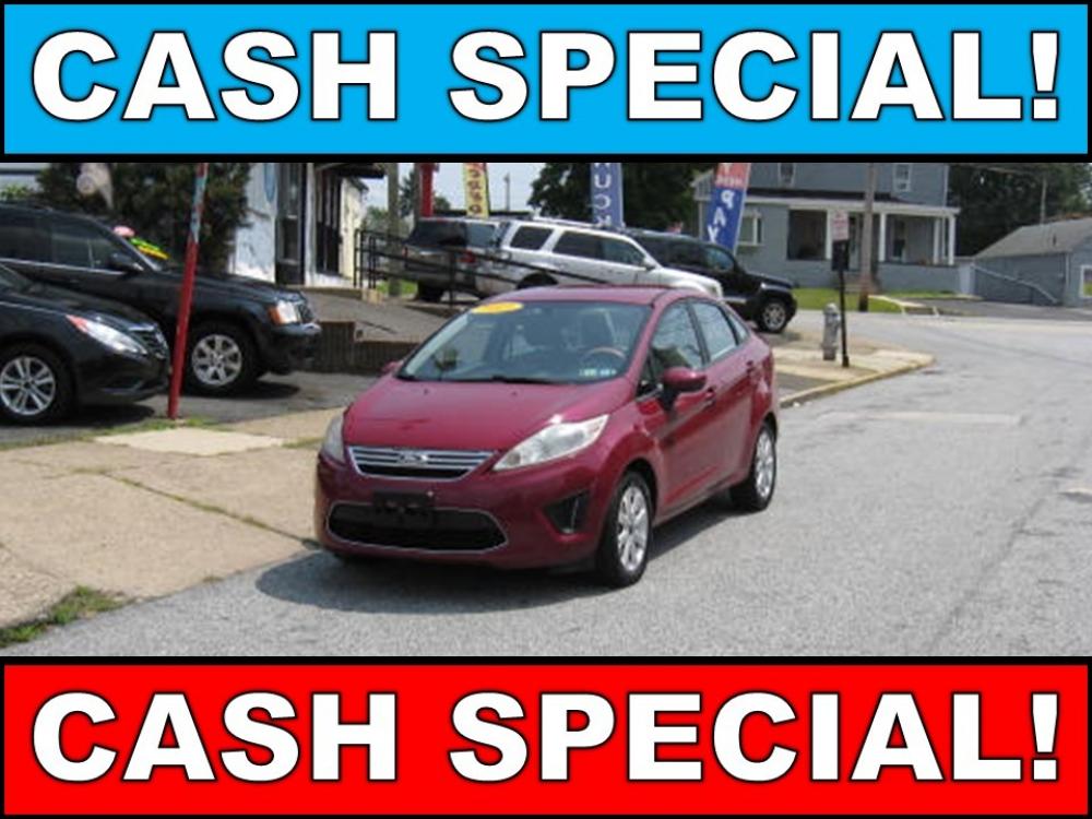2011 Burgundy /Gray Ford Fiesta SE Sedan (3FADP4BJ2BM) with an 1.6L L4 DOHC 16V engine, Automatic transmission, located at 577 Chester Pike, Prospect Park, PA, 19076, (610) 237-1015, 39.886154, -75.302338 - Photo #0