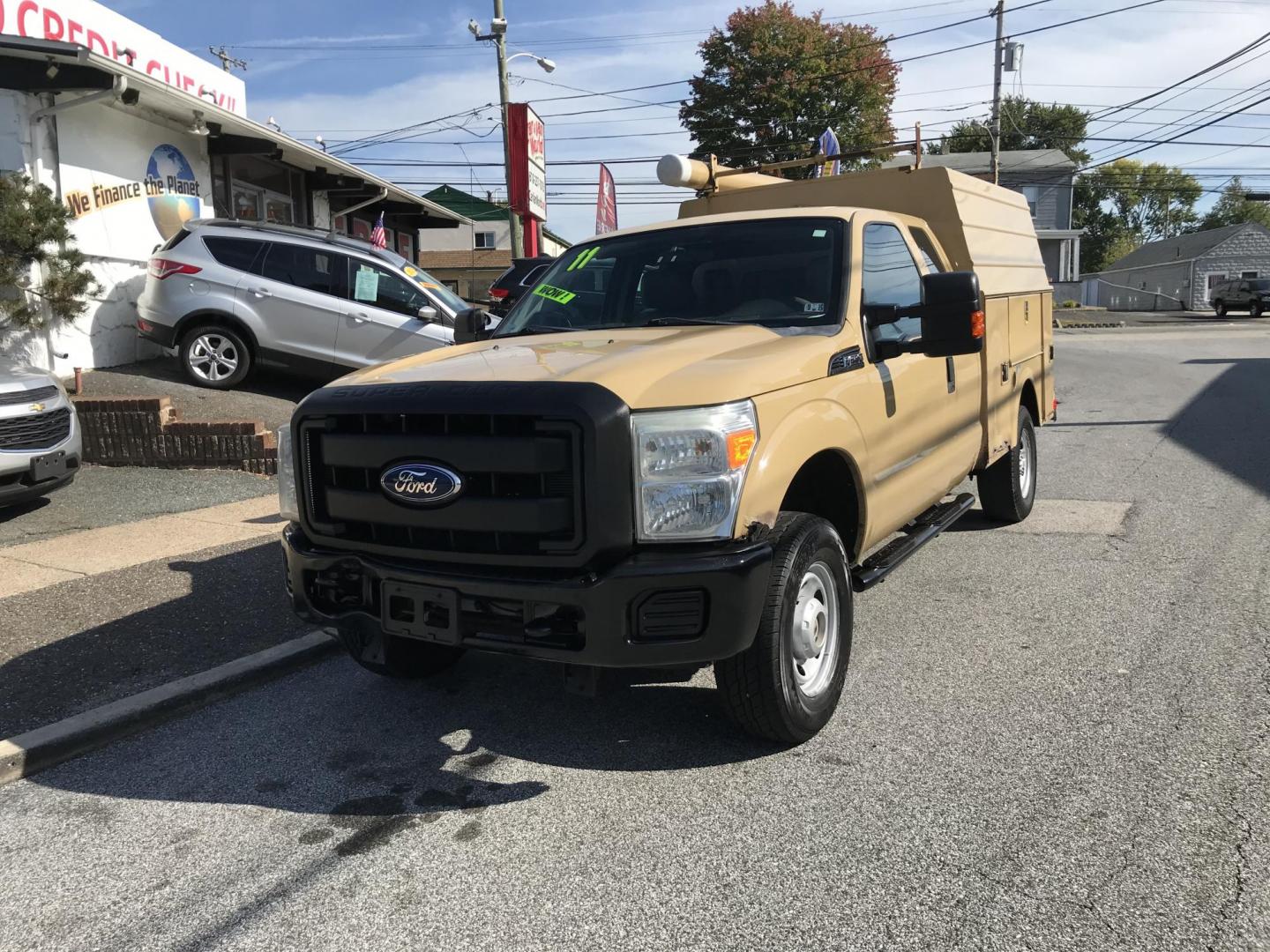 2011 Tan /Gray Ford F-250 SD SuperCab 4WD (1FT7X2B66BE) with an 6.2L V8 OHV 16V engine, 6-Speed Automatic transmission, located at 577 Chester Pike, Prospect Park, PA, 19076, (610) 237-1015, 39.886154, -75.302338 - Photo#0