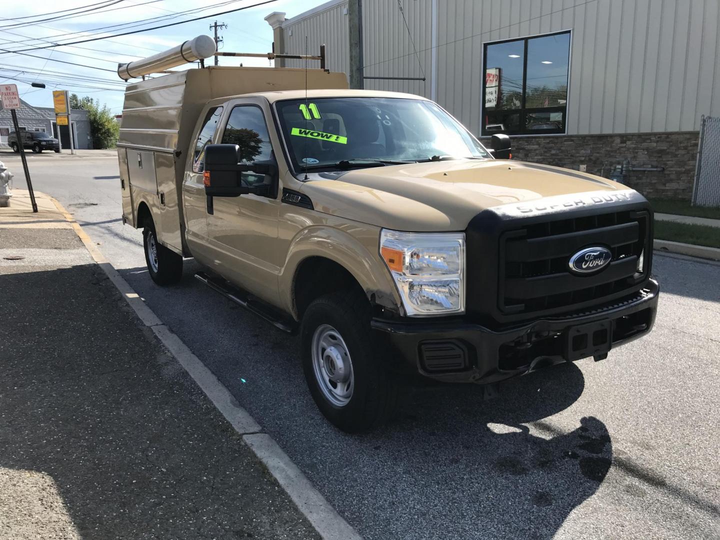 2011 Tan /Gray Ford F-250 SD SuperCab 4WD (1FT7X2B66BE) with an 6.2L V8 OHV 16V engine, 6-Speed Automatic transmission, located at 577 Chester Pike, Prospect Park, PA, 19076, (610) 237-1015, 39.886154, -75.302338 - Photo#1
