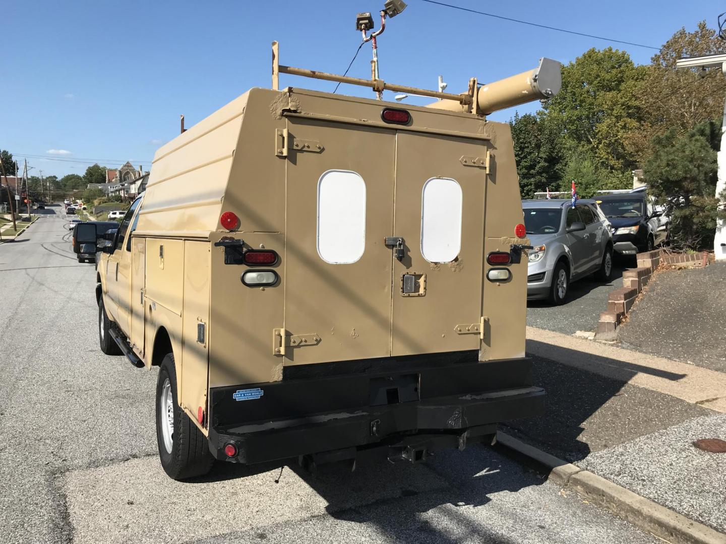 2011 Tan /Gray Ford F-250 SD SuperCab 4WD (1FT7X2B66BE) with an 6.2L V8 OHV 16V engine, 6-Speed Automatic transmission, located at 577 Chester Pike, Prospect Park, PA, 19076, (610) 237-1015, 39.886154, -75.302338 - Photo#3