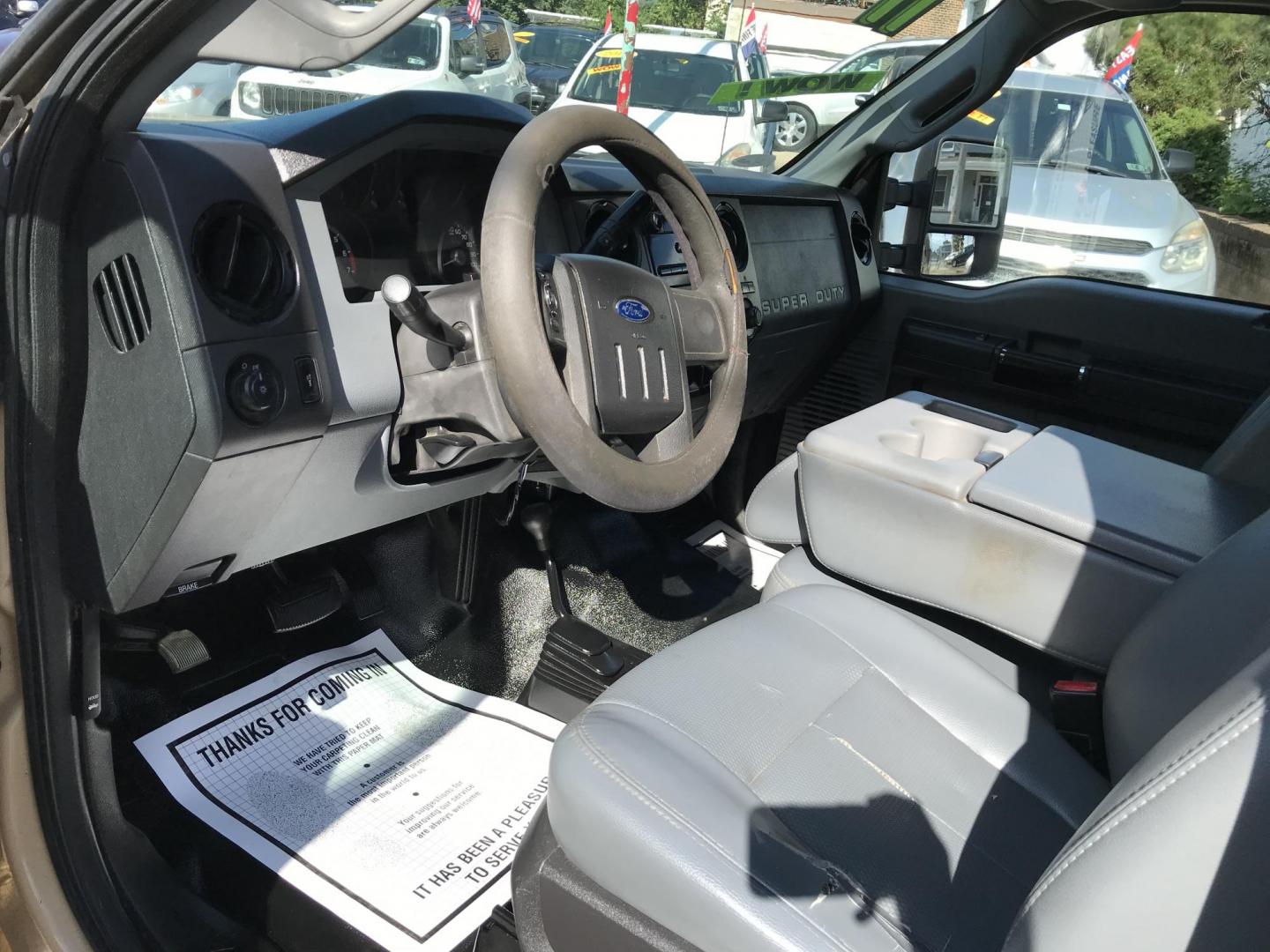 2011 Tan /Gray Ford F-250 SD SuperCab 4WD (1FT7X2B66BE) with an 6.2L V8 OHV 16V engine, 6-Speed Automatic transmission, located at 577 Chester Pike, Prospect Park, PA, 19076, (610) 237-1015, 39.886154, -75.302338 - Photo#6