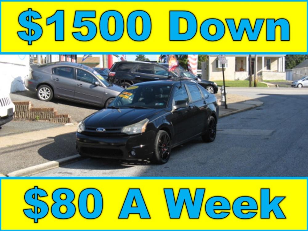 2010 Black /Black Ford Focus SES Sedan (1FAHP3GN7AW) with an 2.0L L4 DOHC 16V engine, Automatic transmission, located at 577 Chester Pike, Prospect Park, PA, 19076, (610) 237-1015, 39.886154, -75.302338 - Photo #0