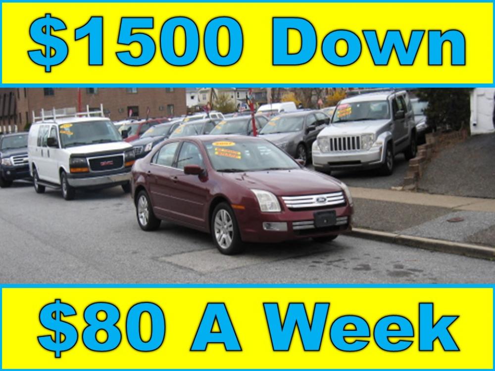 2007 Maroon /Tan Ford Fusion V6 SEL (3FAHP08117R) with an 3.0L V6 DOHC 24V engine, Automatic transmission, located at 577 Chester Pike, Prospect Park, PA, 19076, (610) 237-1015, 39.886154, -75.302338 - Photo #0