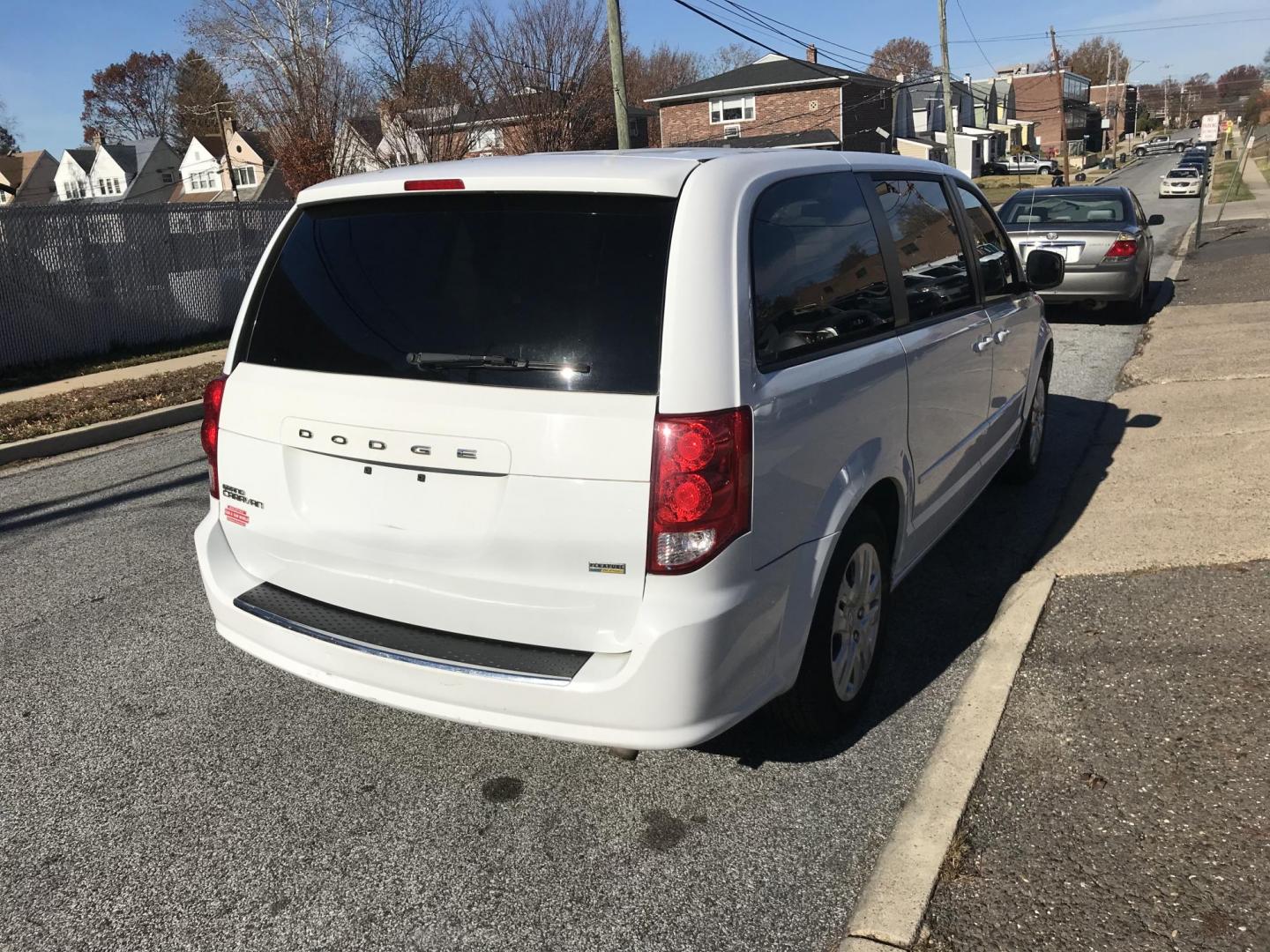 2014 White /Gray Dodge Grand Caravan SE (2C4RDGBG6ER) with an 3.6L V6 DOHC 24V engine, 6-Speed Automatic transmission, located at 577 Chester Pike, Prospect Park, PA, 19076, (610) 237-1015, 39.886154, -75.302338 - 14 Dodge Grand Caravan: Stow N' Go seating, 7 passengers, SUPER clean, new PA inspection, great for families, runs EXCELLENT! - Photo#2