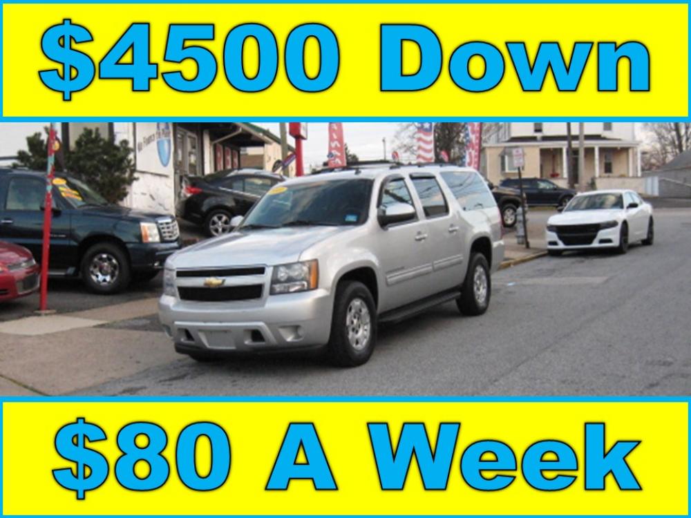 2011 /Gray Chevrolet Suburban LS 1500 (1GNSCHE01BR) with an 5.3L V8 OHV 16V FFV engine, 4-Speed Automatic transmission, located at 577 Chester Pike, Prospect Park, PA, 19076, (610) 237-1015, 39.886154, -75.302338 - Photo #0