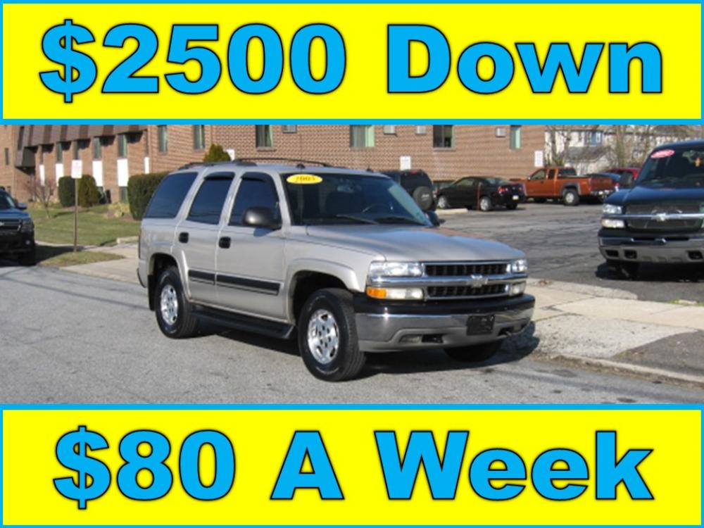 2005 Silver /Gray Chevrolet Tahoe 4WD (1GNEK13T35J) with an 5.3L V8 OHV 16V engine, 4-Speed Automatic Overdrive transmission, located at 577 Chester Pike, Prospect Park, PA, 19076, (610) 237-1015, 39.886154, -75.302338 - Photo #0