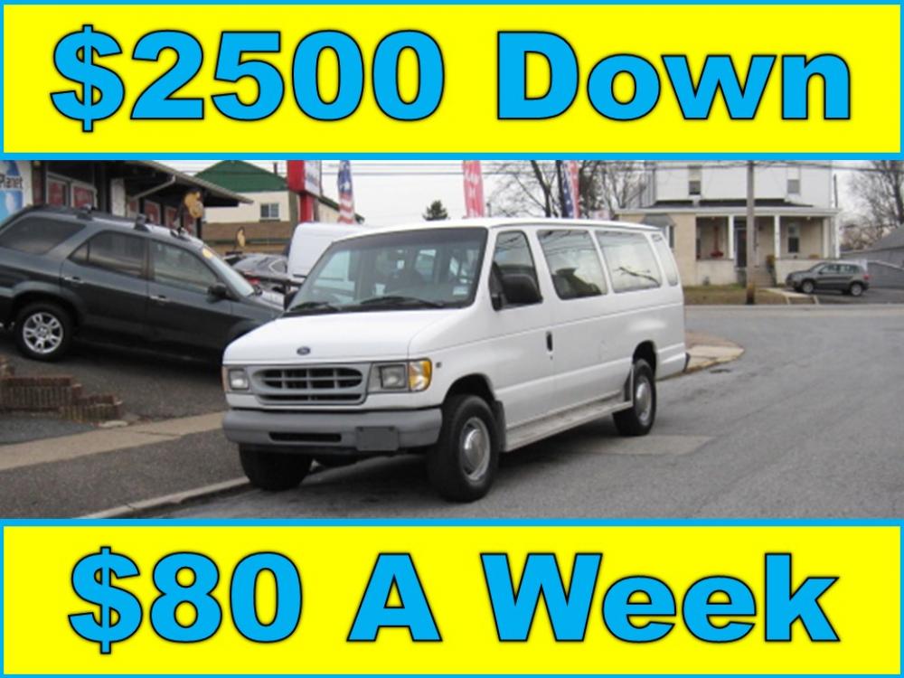 1998 White /Gray Ford Club Wagon XL Super (1FBSS31L4WH) with an 5.4L V8 SOHC 16V engine, 4-Speed Automatic Overdrive transmission, located at 577 Chester Pike, Prospect Park, PA, 19076, (610) 237-1015, 39.886154, -75.302338 - 98 Ford E350: 15 Passenger Van, only 101k miles, hard to find, runs EXCELLENT! This vehicle comes inspected and has been given a bumper to bumper safety check. It is very clean, reliable, and well maintained. We offer a unique pay plan that is known for being the easiest and fastest financing opt - Photo #0