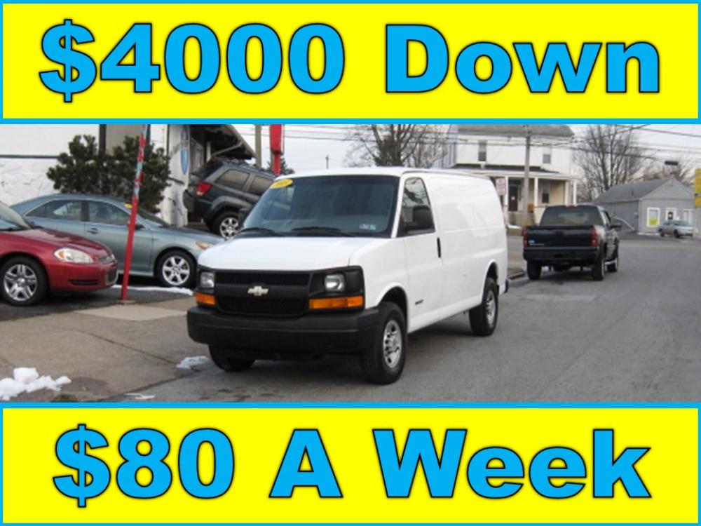2005 White /Gray Chevrolet Express 2500 Cargo (1GCGG25V951) with an 4.8L V8 OHV 16V engine, 4-Speed Automatic Overdrive transmission, located at 577 Chester Pike, Prospect Park, PA, 19076, (610) 237-1015, 39.886154, -75.302338 - Photo #0