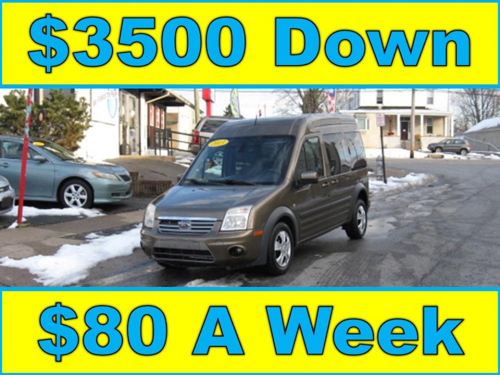 2013 Brown /Gray Ford Transit Connect XLT Premium Wagon (NM0KS9CN8DT) with an 2.0L L4 DOHC 16V engine, 4-Speed Automatic transmission, located at 577 Chester Pike, Prospect Park, PA, 19076, (610) 237-1015, 39.886154, -75.302338 - Photo #0
