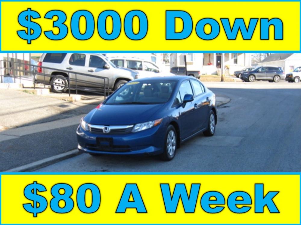 2012 Blue /Gray Honda Civic LX Sedan 5-Speed AT (19XFB2F59CE) with an 1.8L L4 SOHC 16V engine, 5-Speed Automatic transmission, located at 577 Chester Pike, Prospect Park, PA, 19076, (610) 237-1015, 39.886154, -75.302338 - Photo #0
