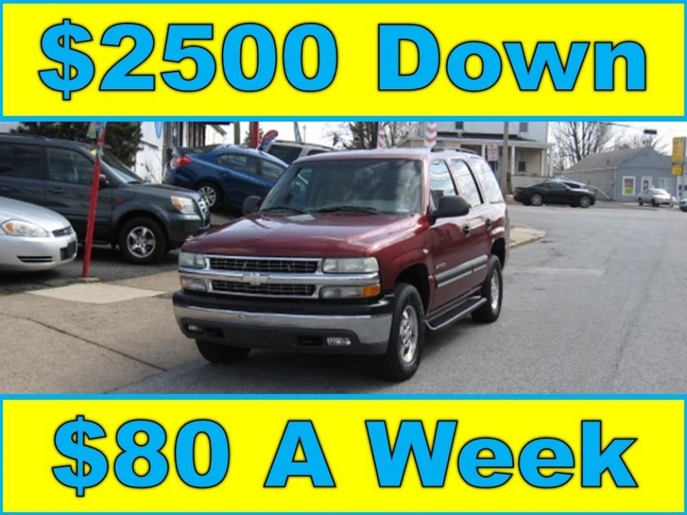 2003 Maroon /Tan Chevrolet Tahoe 4WD (1GNEK13Z83J) with an 5.3L V8 OHV 16V FFV engine, 4-Speed Automatic Overdrive transmission, located at 577 Chester Pike, Prospect Park, PA, 19076, (610) 237-1015, 39.886154, -75.302338 - Photo #0