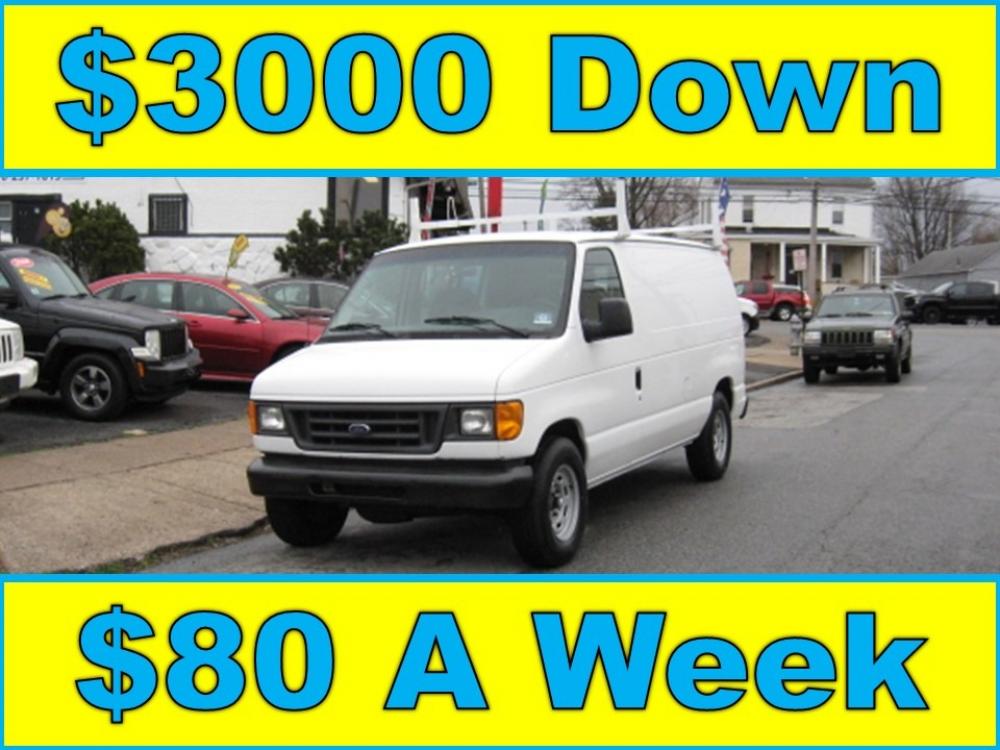 2006 White /Gray Ford E-Series Van E-150 (1FTRE14LX6D) with an 5.4L V8 SOHC 16V engine, 4-Speed Automatic transmission, located at 577 Chester Pike, Prospect Park, PA, 19076, (610) 237-1015, 39.886154, -75.302338 - Photo #0