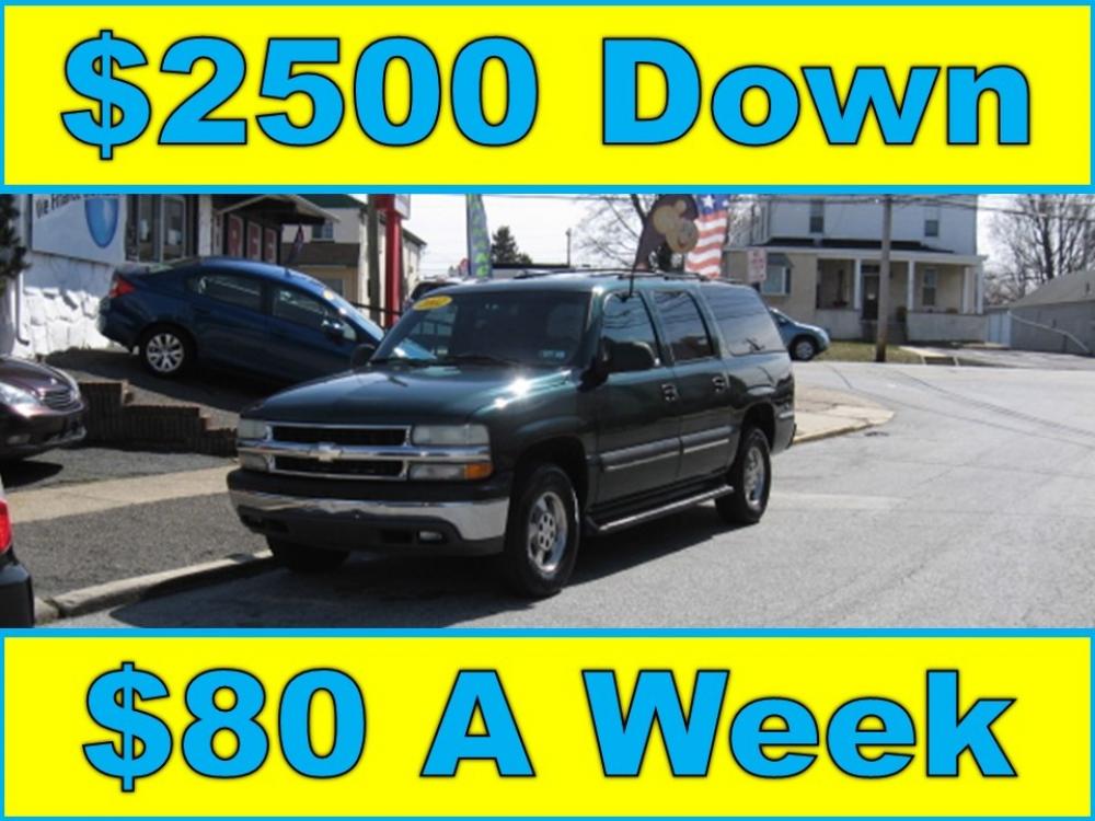 2002 Green Chevrolet Suburban 1500 (1GNEC16Z92J) with an 5.3L V8 OHV 16V FFV engine, 4-Speed Automatic Overdrive transmission, located at 577 Chester Pike, Prospect Park, PA, 19076, (610) 237-1015, 39.886154, -75.302338 - Photo #0