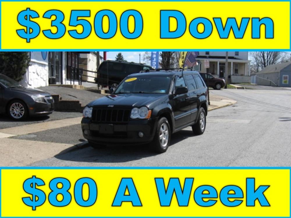 2008 Black /Tan Jeep Grand Cherokee Laredo 4WD (1J8GR48K58C) with an 3.7L V6 SOHC 12V engine, 5-Speed Automatic Overdrive transmission, located at 577 Chester Pike, Prospect Park, PA, 19076, (610) 237-1015, 39.886154, -75.302338 - Photo #0