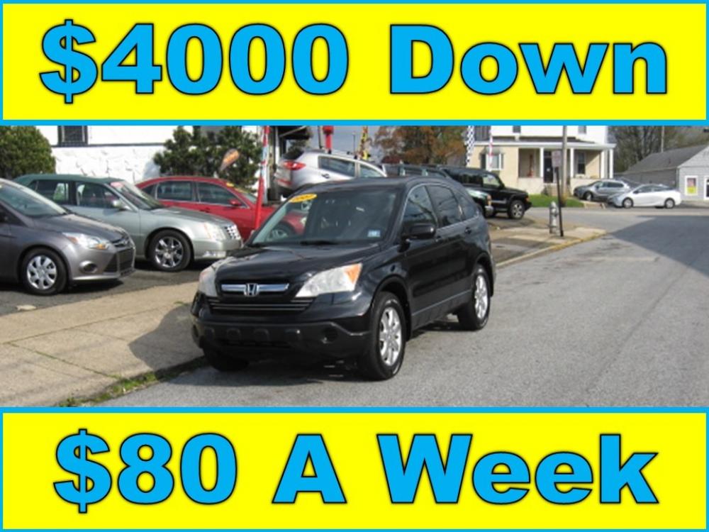 2007 Black /Gray Honda CR-V EX (JHLRE38517C) with an 2.4L L4 DOHC 16V engine, 5-Speed Automatic Overdrive transmission, located at 577 Chester Pike, Prospect Park, PA, 19076, (610) 237-1015, 39.886154, -75.302338 - Photo #0