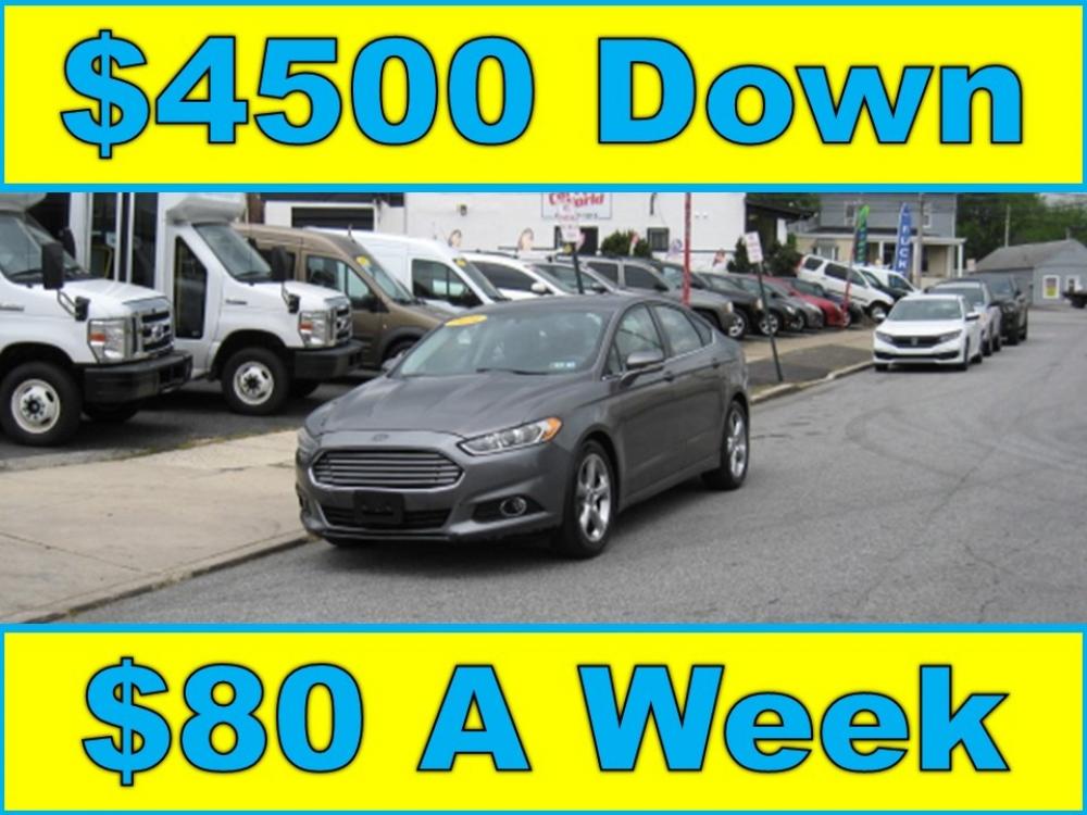 2014 Gray /Gray Ford Fusion SE (1FA6P0H7XE5) with an 2.5L L4 DOHC 16V engine, Automatic transmission, located at 577 Chester Pike, Prospect Park, PA, 19076, (610) 237-1015, 39.886154, -75.302338 - Photo #0