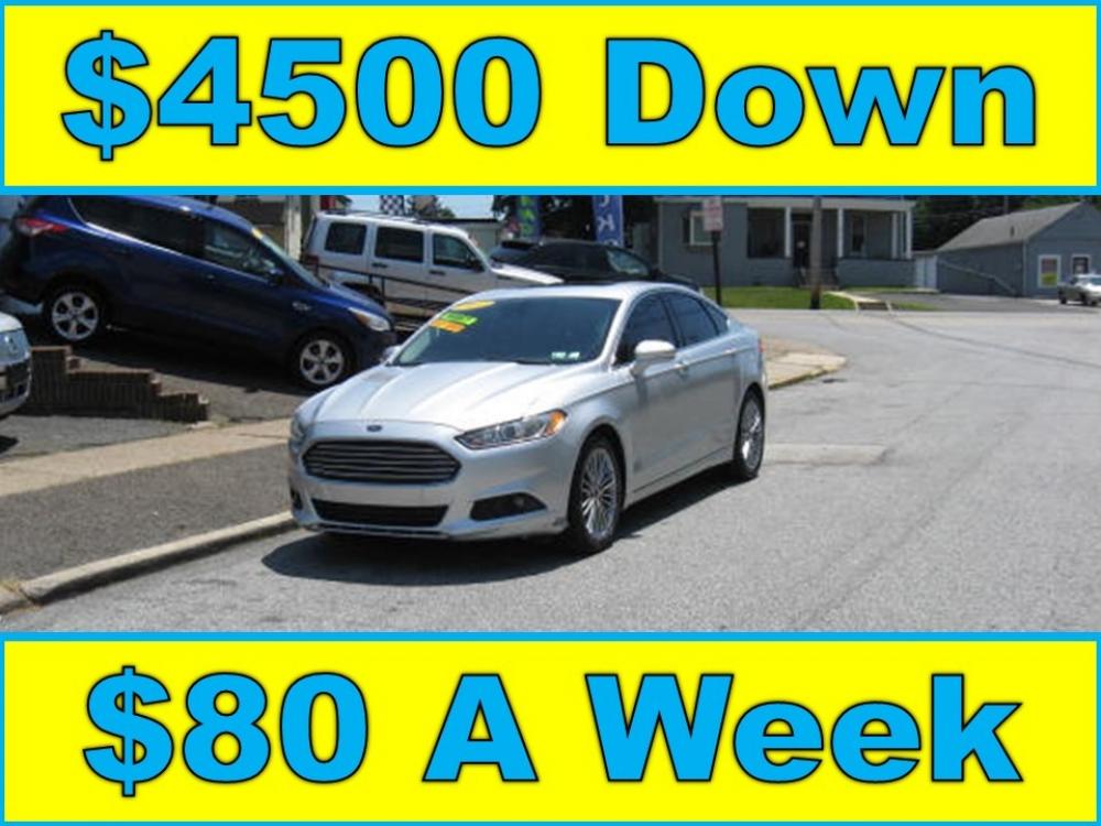 2013 Silver /Gray Ford Fusion SE (3FA6P0H9XDR) with an 2.0L L4 DOHC 16V engine, Automatic transmission, located at 577 Chester Pike, Prospect Park, PA, 19076, (610) 237-1015, 39.886154, -75.302338 - Photo #0