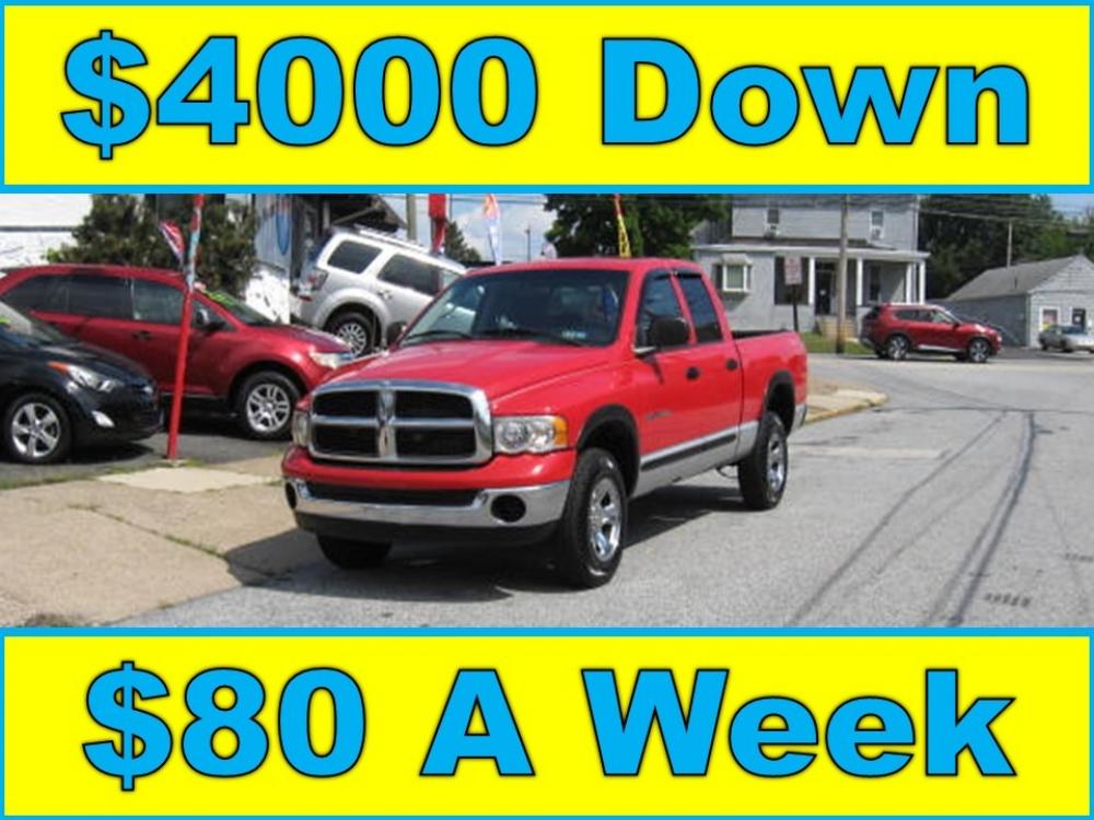 2005 Red /Gray Dodge Ram 1500 Laramie Quad Cab Long Bed 4WD (1D7HU18D15J) with an 5.7L V8 OHV 16V engine, 5-Speed Automatic Overdrive transmission, located at 577 Chester Pike, Prospect Park, PA, 19076, (610) 237-1015, 39.886154, -75.302338 - Photo #0