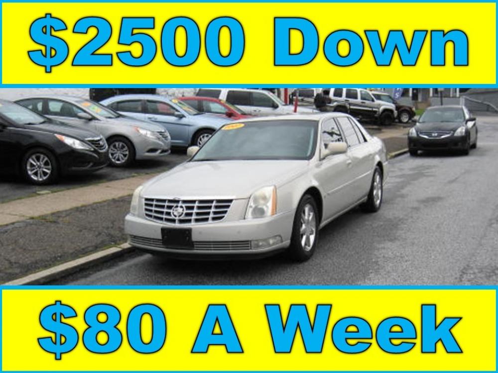2007 White /Tan Cadillac DTS Luxury 1 (1G6KD57YX7U) with an 4.6L V8 DOHC 32V engine, 4-Speed Automatic Overdrive transmission, located at 577 Chester Pike, Prospect Park, PA, 19076, (610) 237-1015, 39.886154, -75.302338 - Photo #0