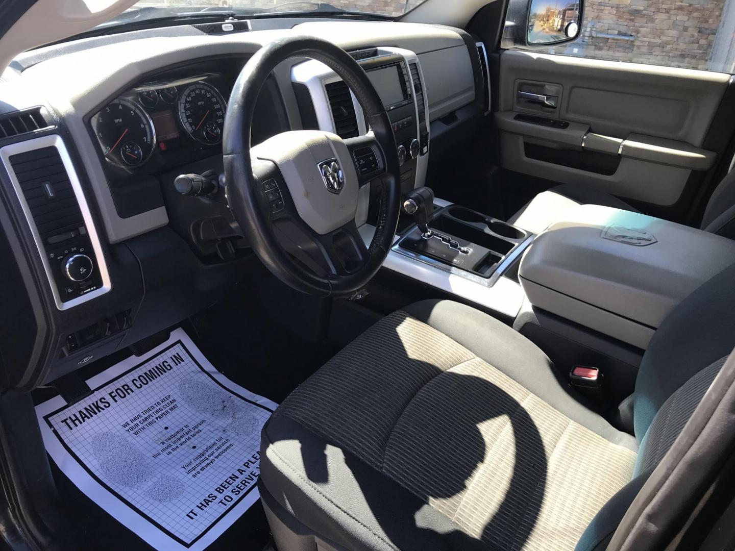 2012 Black /Tan Dodge Ram 1500 SLT Quad Cab 4WD (1C6RD7GT9CS) with an 5.7L V8 OHV 16V engine, 5-Speed Automatic transmission, located at 577 Chester Pike, Prospect Park, PA, 19076, (610) 237-1015, 39.886154, -75.302338 - Photo#10