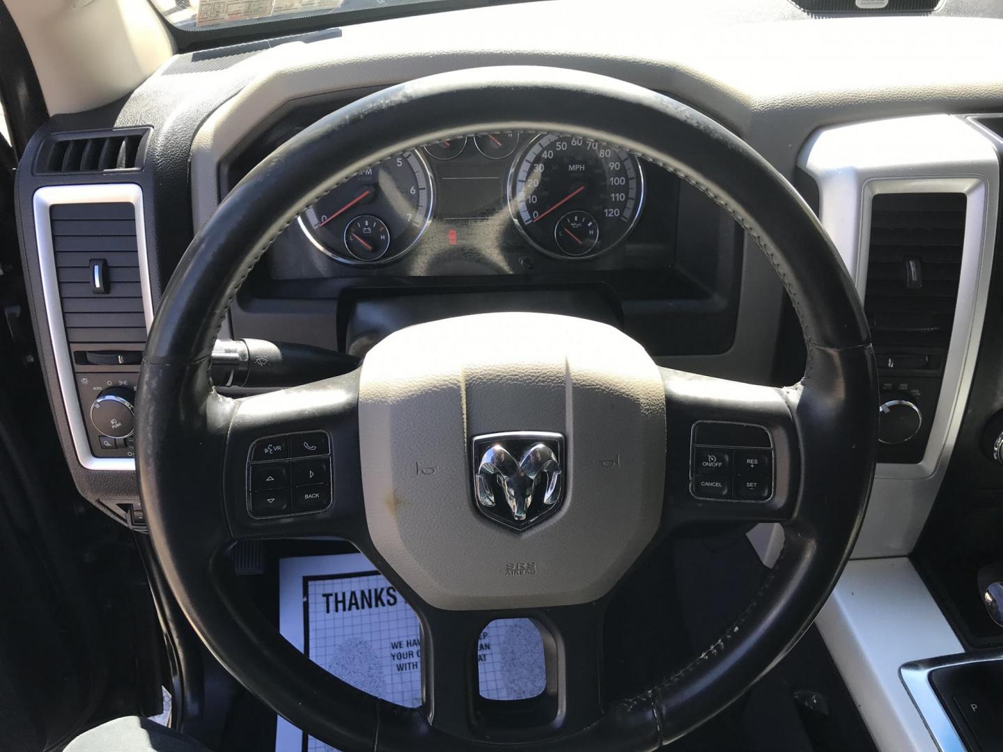 2012 Black /Tan Dodge Ram 1500 SLT Quad Cab 4WD (1C6RD7GT9CS) with an 5.7L V8 OHV 16V engine, 5-Speed Automatic transmission, located at 577 Chester Pike, Prospect Park, PA, 19076, (610) 237-1015, 39.886154, -75.302338 - Photo#12
