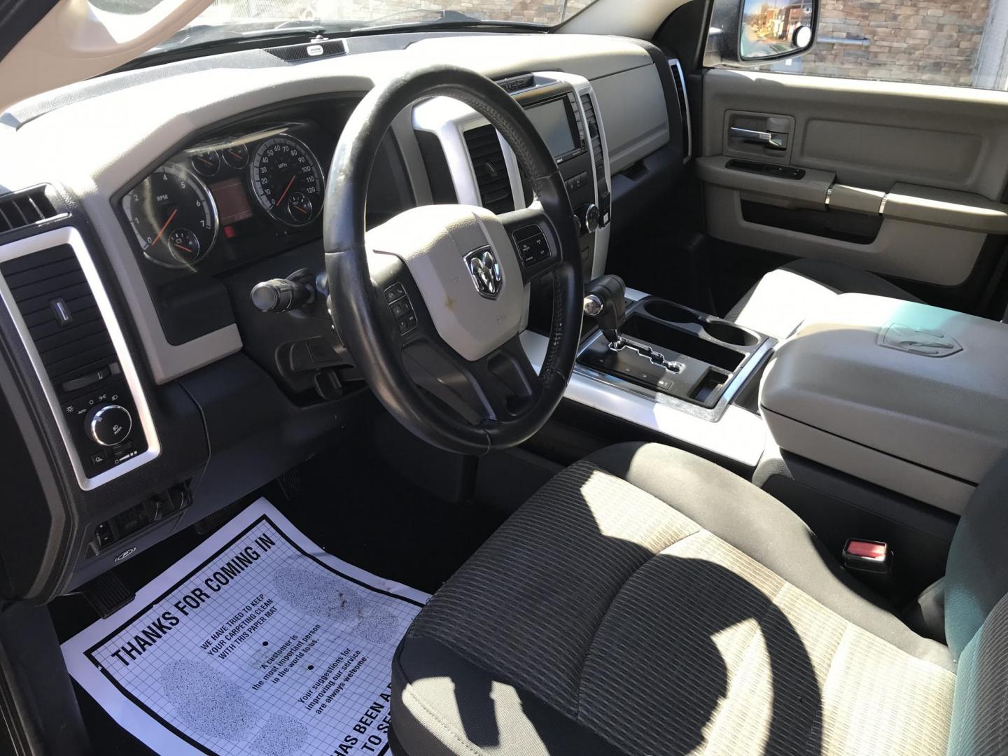 2012 Black /Tan Dodge Ram 1500 SLT Quad Cab 4WD (1C6RD7GT9CS) with an 5.7L V8 OHV 16V engine, 5-Speed Automatic transmission, located at 577 Chester Pike, Prospect Park, PA, 19076, (610) 237-1015, 39.886154, -75.302338 - Photo#13