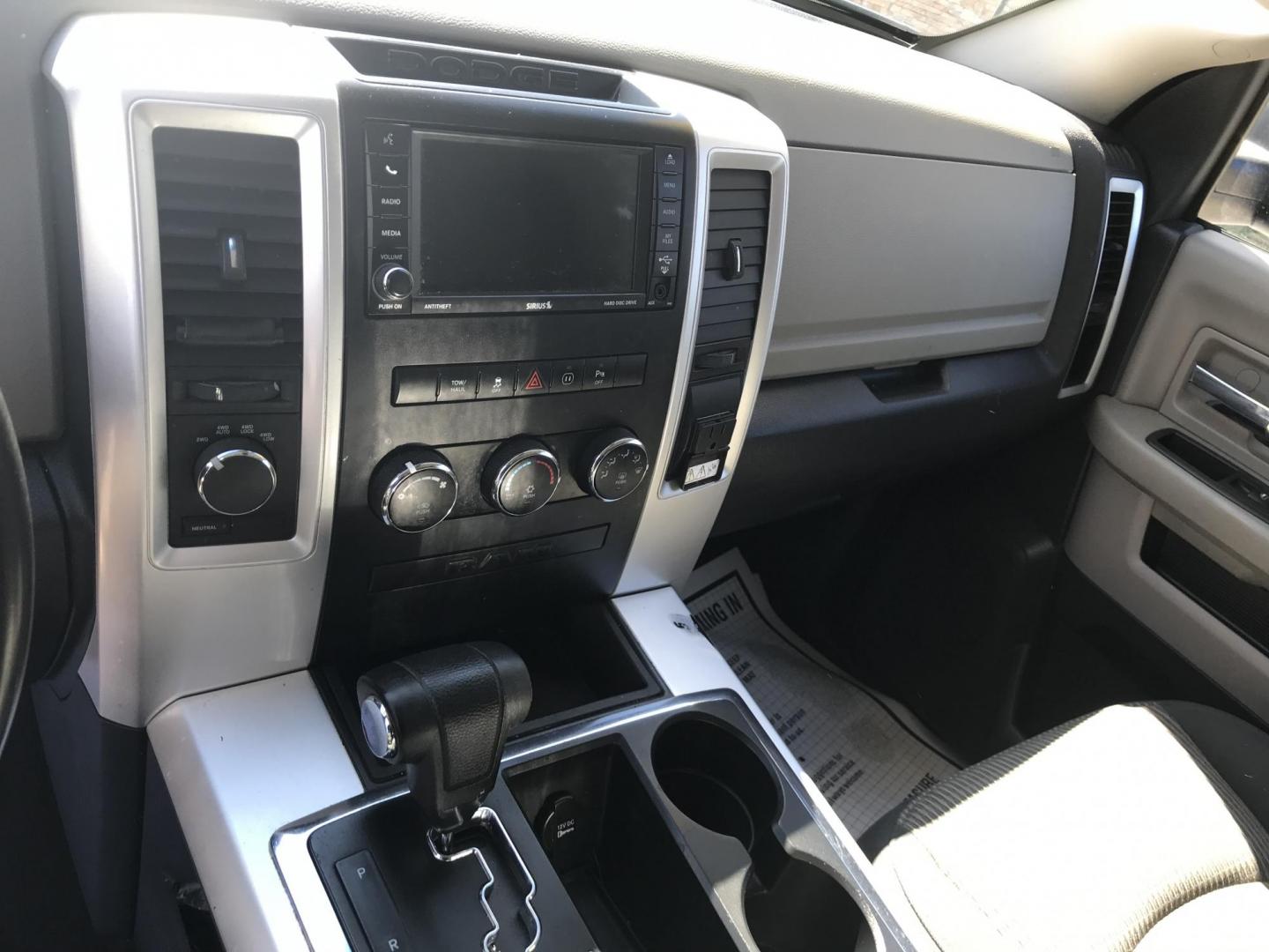 2012 Black /Tan Dodge Ram 1500 SLT Quad Cab 4WD (1C6RD7GT9CS) with an 5.7L V8 OHV 16V engine, 5-Speed Automatic transmission, located at 577 Chester Pike, Prospect Park, PA, 19076, (610) 237-1015, 39.886154, -75.302338 - Photo#14
