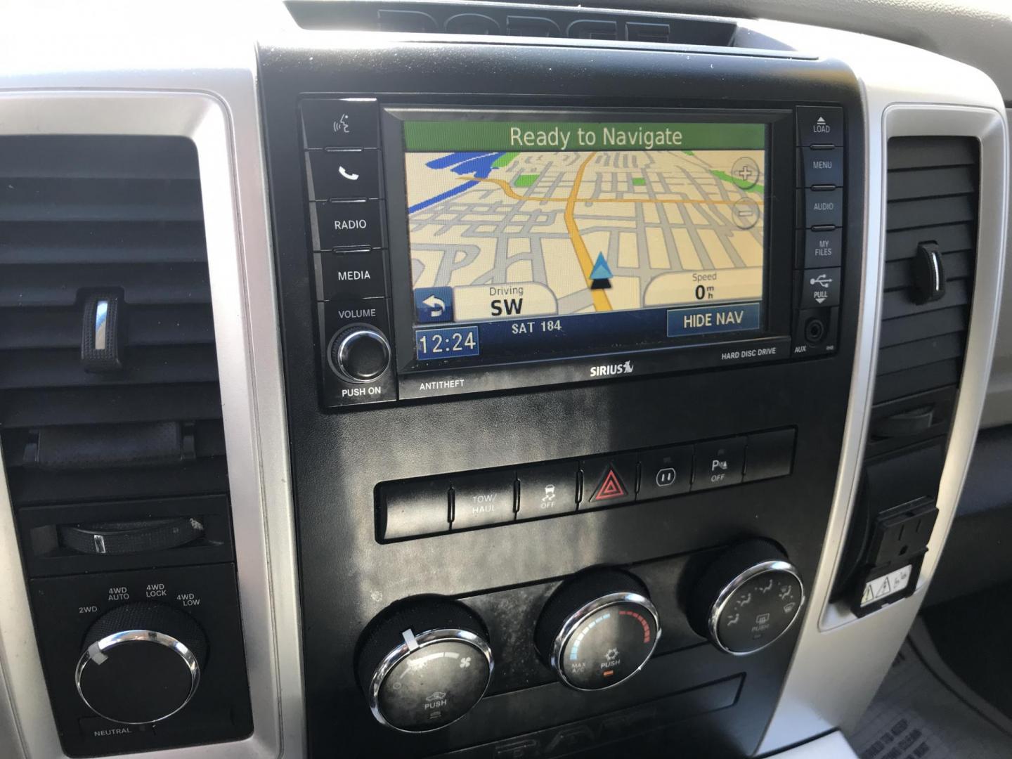 2012 Black /Tan Dodge Ram 1500 SLT Quad Cab 4WD (1C6RD7GT9CS) with an 5.7L V8 OHV 16V engine, 5-Speed Automatic transmission, located at 577 Chester Pike, Prospect Park, PA, 19076, (610) 237-1015, 39.886154, -75.302338 - Photo#16