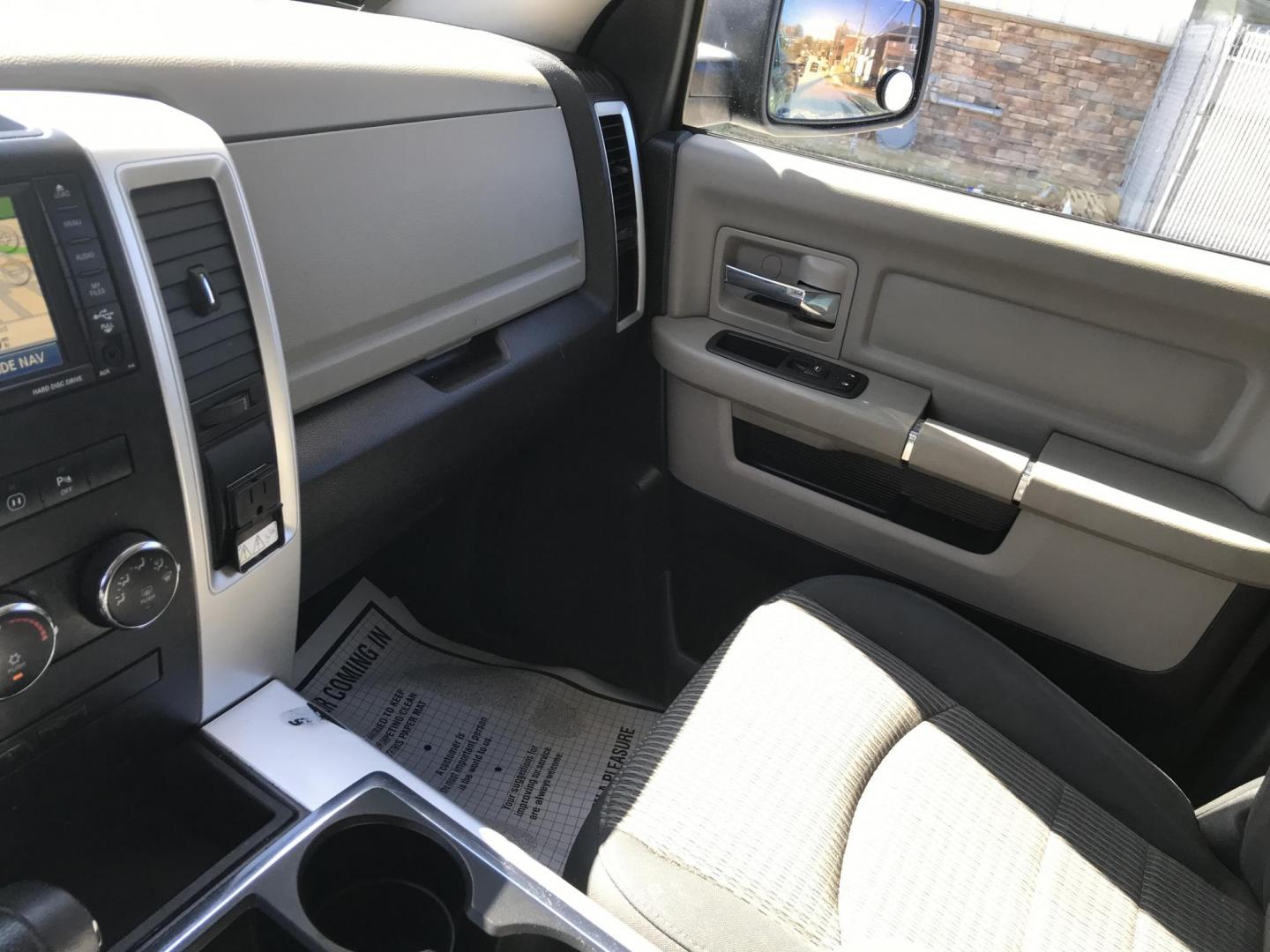 2012 Black /Tan Dodge Ram 1500 SLT Quad Cab 4WD (1C6RD7GT9CS) with an 5.7L V8 OHV 16V engine, 5-Speed Automatic transmission, located at 577 Chester Pike, Prospect Park, PA, 19076, (610) 237-1015, 39.886154, -75.302338 - Photo#17