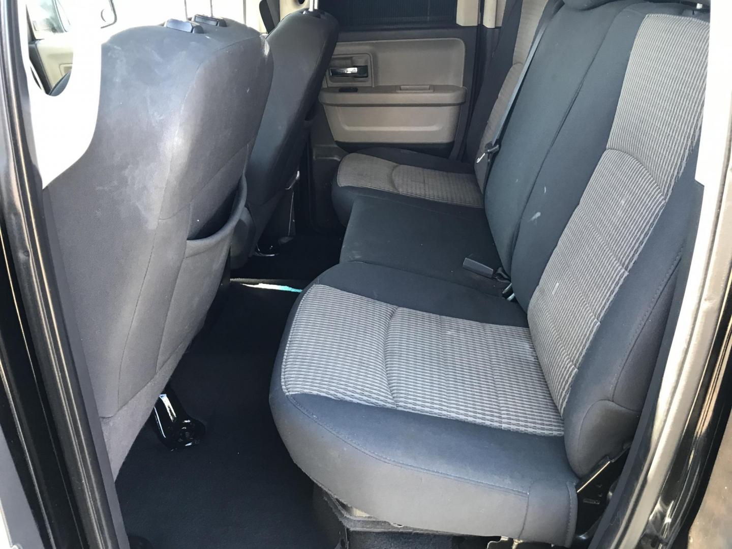 2012 Black /Tan Dodge Ram 1500 SLT Quad Cab 4WD (1C6RD7GT9CS) with an 5.7L V8 OHV 16V engine, 5-Speed Automatic transmission, located at 577 Chester Pike, Prospect Park, PA, 19076, (610) 237-1015, 39.886154, -75.302338 - Photo#18