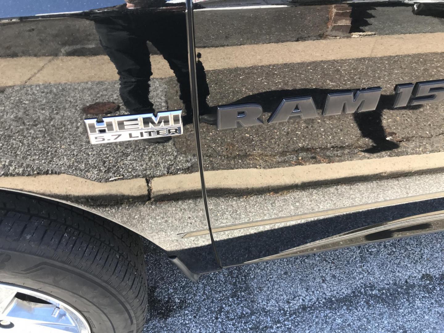 2012 Black /Tan Dodge Ram 1500 SLT Quad Cab 4WD (1C6RD7GT9CS) with an 5.7L V8 OHV 16V engine, 5-Speed Automatic transmission, located at 577 Chester Pike, Prospect Park, PA, 19076, (610) 237-1015, 39.886154, -75.302338 - Photo#6