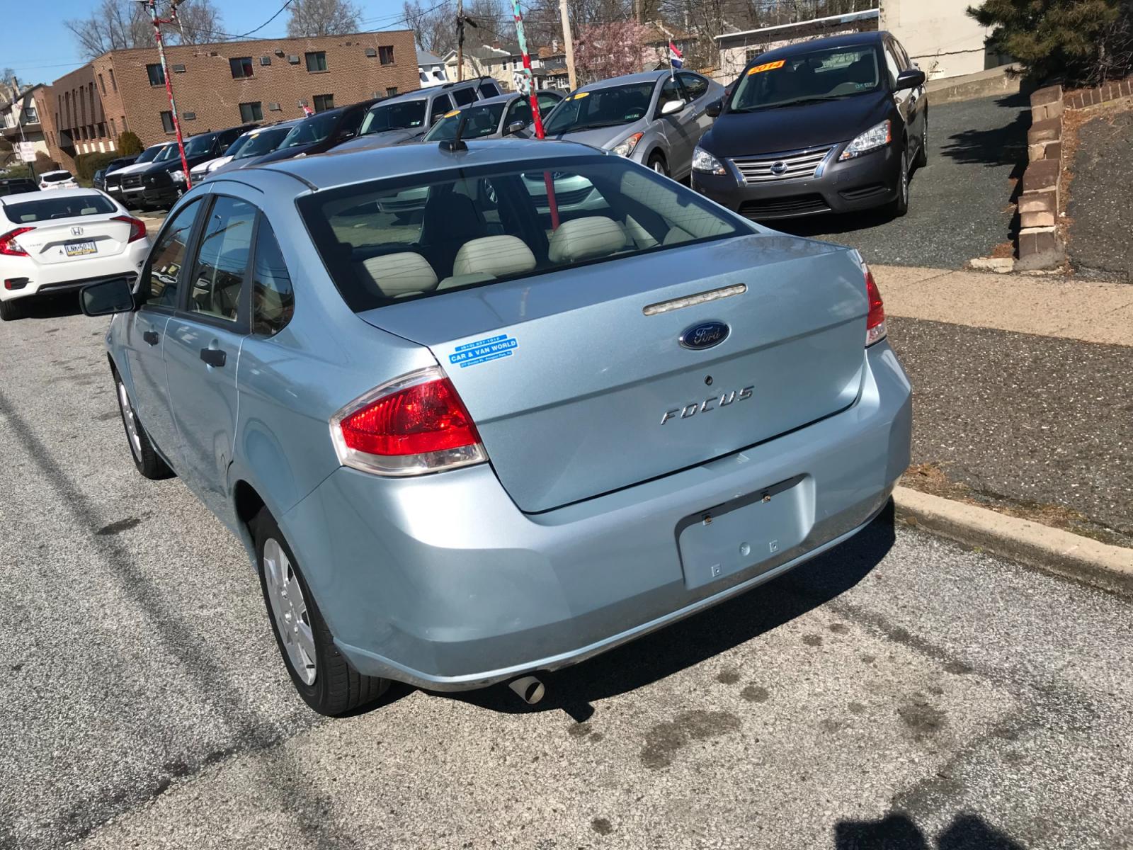2009 Blue /Gray Ford Focus S Sedan (1FAHP34N29W) with an 2.0L L4 DOHC 16V engine, Automatic transmission, located at 577 Chester Pike, Prospect Park, PA, 19076, (610) 237-1015, 39.886154, -75.302338 - Photo #5