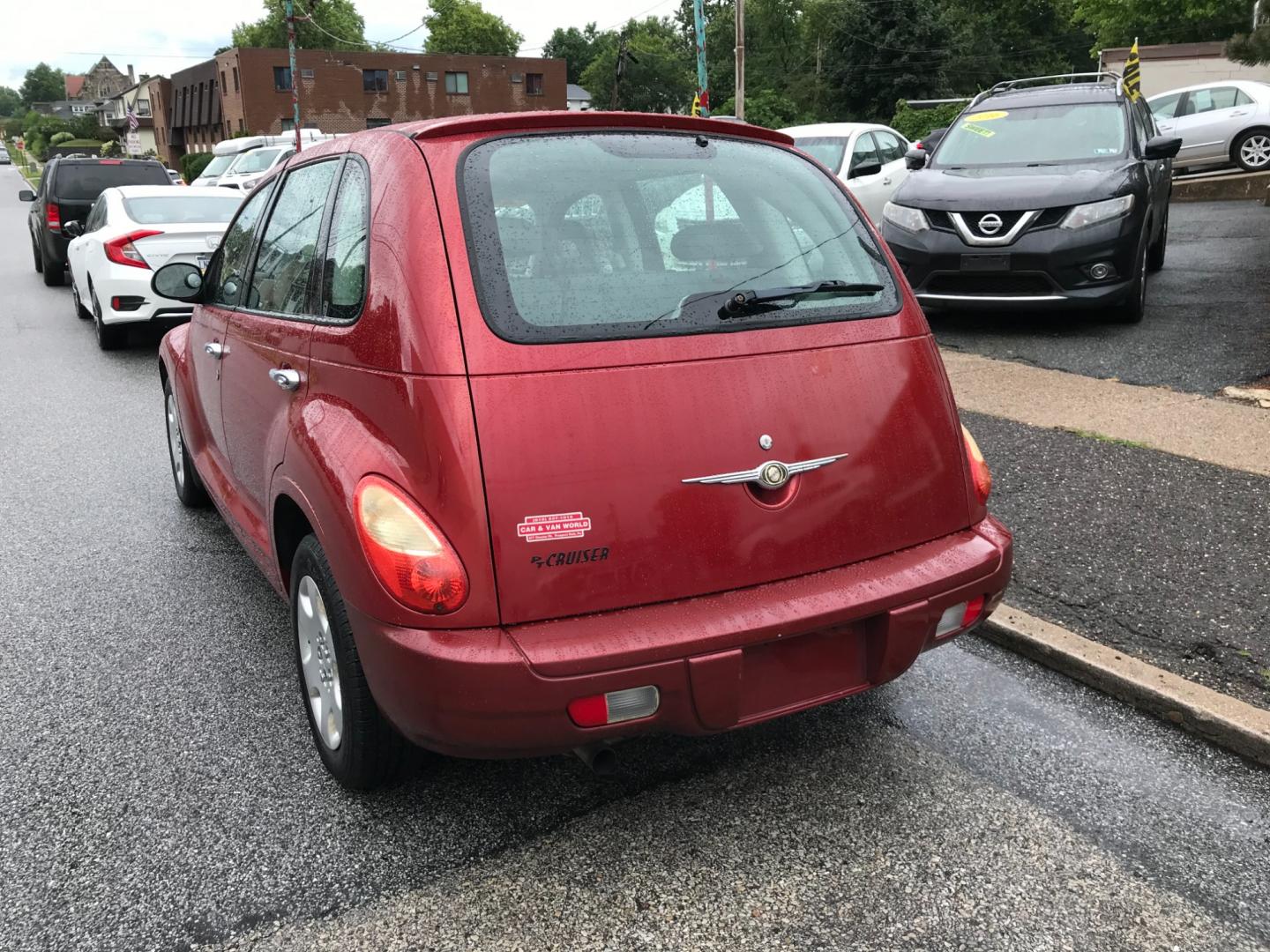 2007 Red /Tan Chrysler PT Cruiser Base (3A4FY48B57T) with an 2.4L L4 DOHC 16V engine, Automatic transmission, located at 577 Chester Pike, Prospect Park, PA, 19076, (610) 237-1015, 39.886154, -75.302338 - Photo#4
