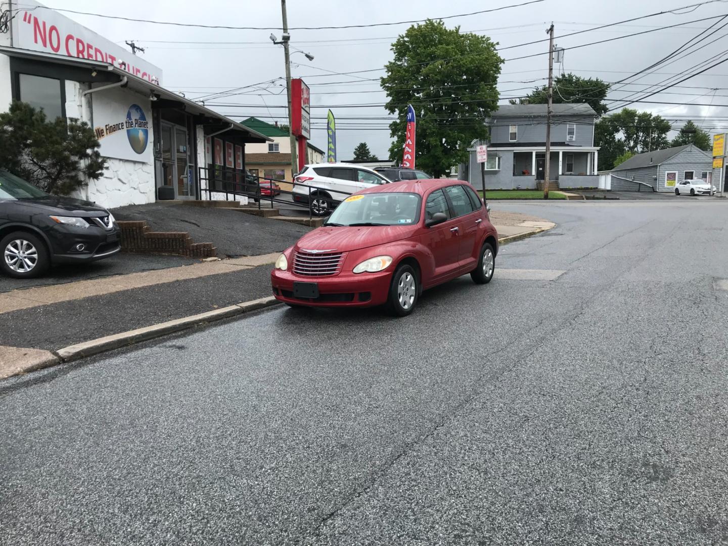 2007 Red /Tan Chrysler PT Cruiser Base (3A4FY48B57T) with an 2.4L L4 DOHC 16V engine, Automatic transmission, located at 577 Chester Pike, Prospect Park, PA, 19076, (610) 237-1015, 39.886154, -75.302338 - Photo#1