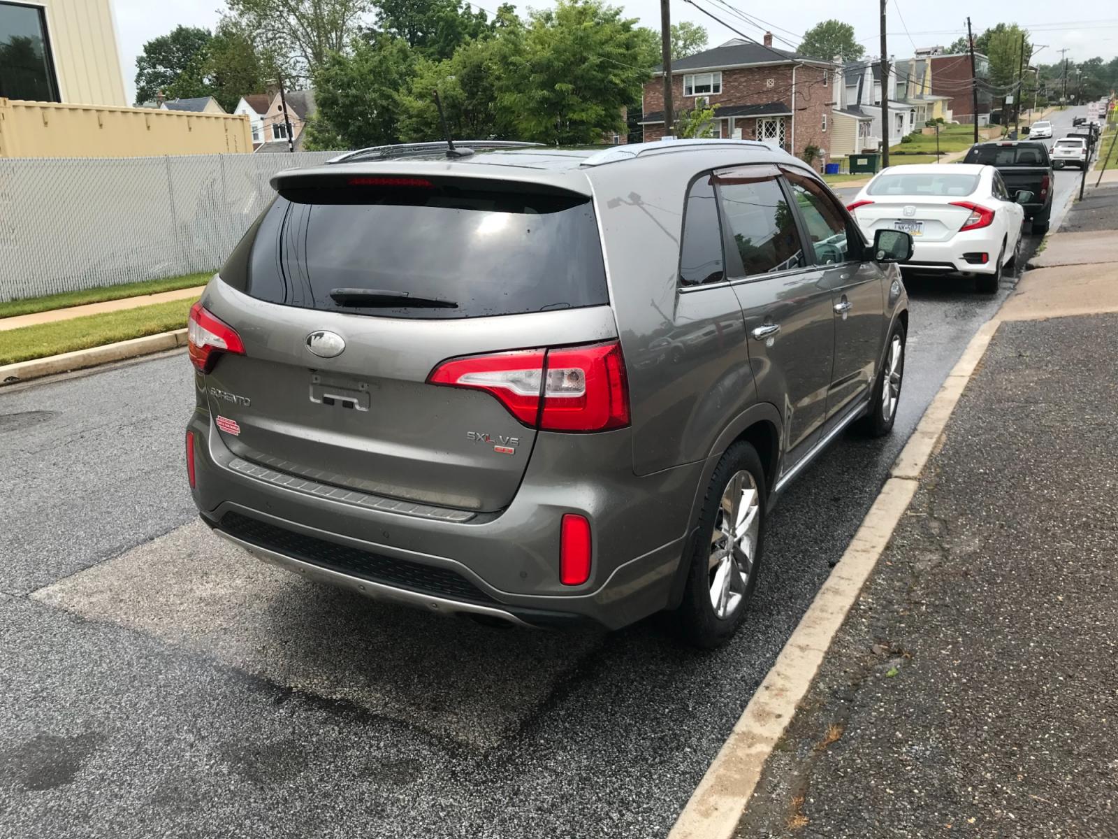 2014 Gray /Gray Kia Sorento SX V6 AWD (5XYKWDA75EG) with an 3.3L V6 DOHC 24V engine, 6-Speed Automatic transmission, located at 577 Chester Pike, Prospect Park, PA, 19076, (610) 237-1015, 39.886154, -75.302338 - 14 Kia Sorento SXL: 3rd row seating, navigation system, panoramic sunroof, all wheel drive, remote start, FULLY LOADED! This vehicle comes inspected and has been given a bumper to bumper safety check. It is very clean, reliable, and well maintained. We offer a unique pay plan that is known for be - Photo #3