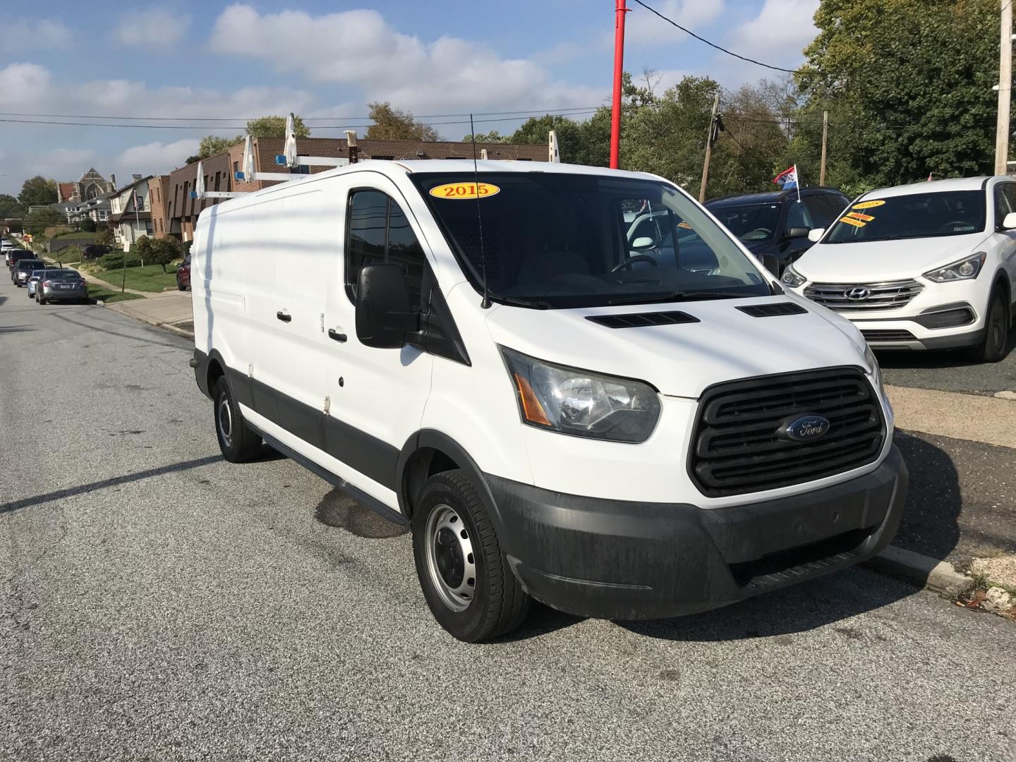 2015 White /Gray Ford Transit 150 Van Low Roof 60/40 Pass. 148-in. WB (1FTNE9ZM7FK) with an 3.7L V6 DOHC 24V engine, 6-Speed Automatic transmission, located at 577 Chester Pike, Prospect Park, PA, 19076, (610) 237-1015, 39.886154, -75.302338 - 15 Ford Transit 150: Ladder racks, multiple pieces of shelving, partition, brand new inspection, runs LIKE NEW! This vehicle comes inspected and has been given a bumper to bumper safety check. It is very clean, reliable, and well maintained. We offer a unique pay plan that is known for being the- Photo#2