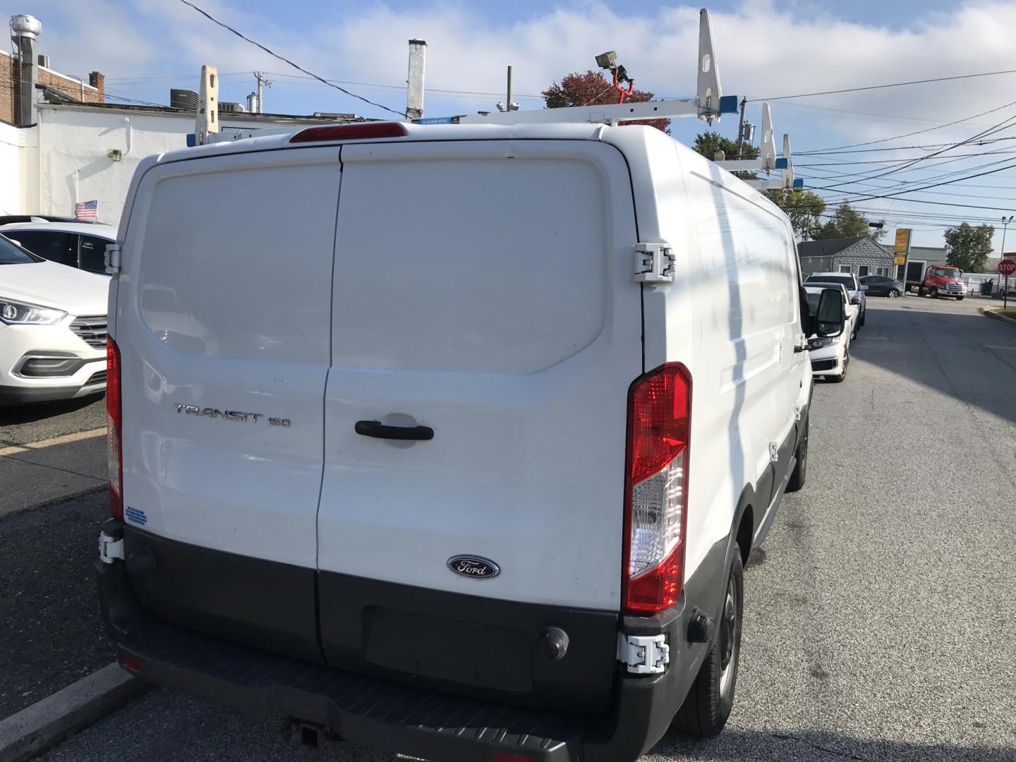 2015 White /Gray Ford Transit 150 Van Low Roof 60/40 Pass. 148-in. WB (1FTNE9ZM7FK) with an 3.7L V6 DOHC 24V engine, 6-Speed Automatic transmission, located at 577 Chester Pike, Prospect Park, PA, 19076, (610) 237-1015, 39.886154, -75.302338 - 15 Ford Transit 150: Ladder racks, multiple pieces of shelving, partition, brand new inspection, runs LIKE NEW! This vehicle comes inspected and has been given a bumper to bumper safety check. It is very clean, reliable, and well maintained. We offer a unique pay plan that is known for being the- Photo#6