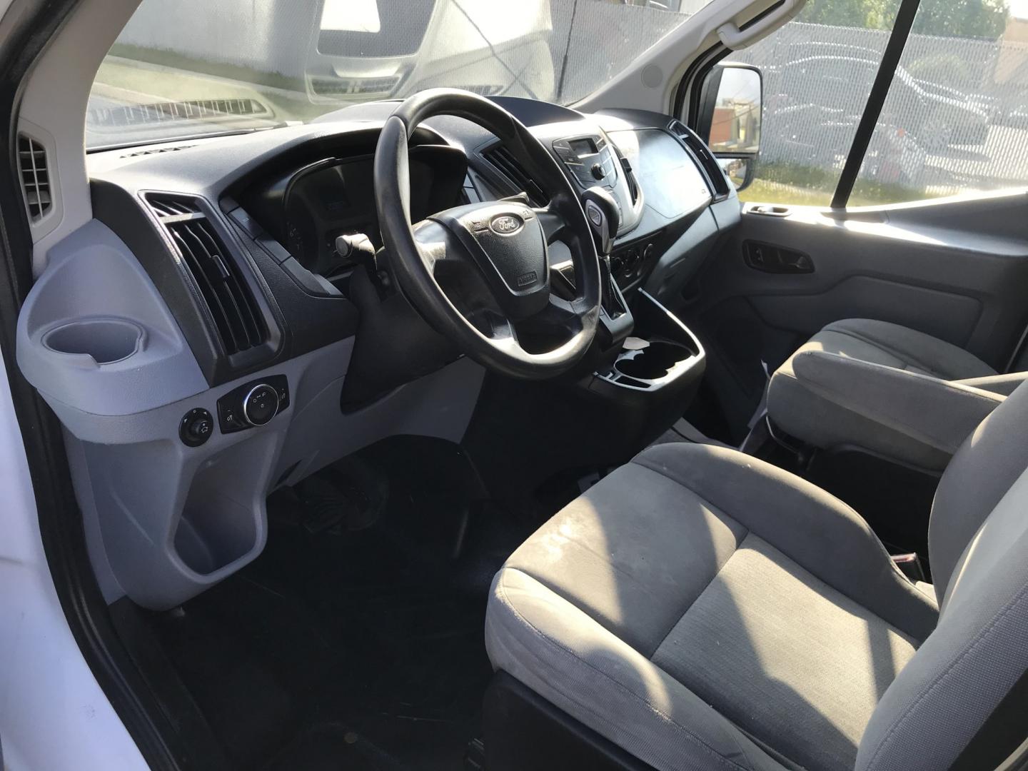 2015 White /Gray Ford Transit 150 Van Low Roof 60/40 Pass. 148-in. WB (1FTNE9ZM7FK) with an 3.7L V6 DOHC 24V engine, 6-Speed Automatic transmission, located at 577 Chester Pike, Prospect Park, PA, 19076, (610) 237-1015, 39.886154, -75.302338 - 15 Ford Transit 150: Ladder racks, multiple pieces of shelving, partition, brand new inspection, runs LIKE NEW! This vehicle comes inspected and has been given a bumper to bumper safety check. It is very clean, reliable, and well maintained. We offer a unique pay plan that is known for being the- Photo#7
