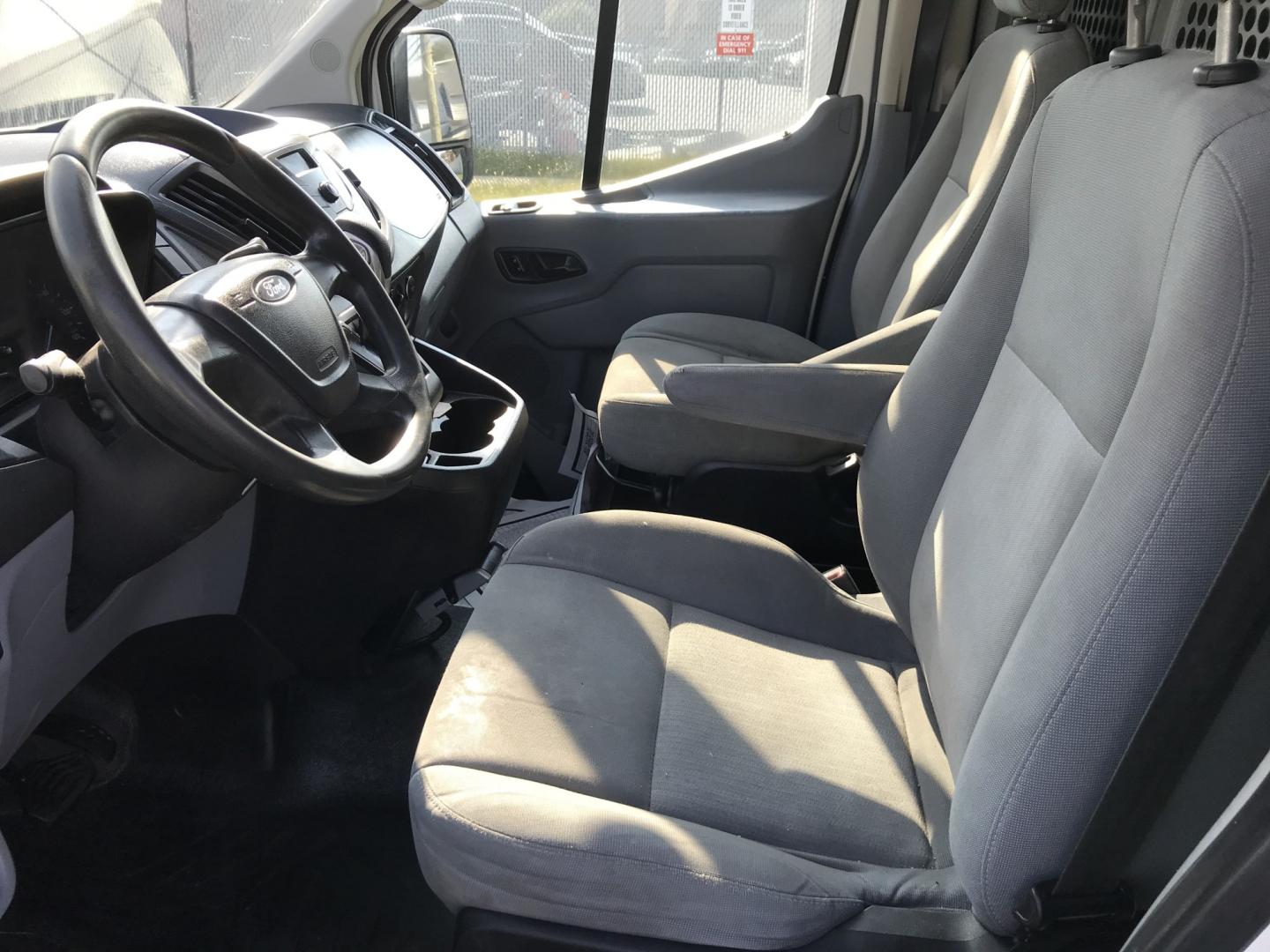 2015 White /Gray Ford Transit 150 Van Low Roof 60/40 Pass. 148-in. WB (1FTNE9ZM7FK) with an 3.7L V6 DOHC 24V engine, 6-Speed Automatic transmission, located at 577 Chester Pike, Prospect Park, PA, 19076, (610) 237-1015, 39.886154, -75.302338 - 15 Ford Transit 150: Ladder racks, multiple pieces of shelving, partition, brand new inspection, runs LIKE NEW! This vehicle comes inspected and has been given a bumper to bumper safety check. It is very clean, reliable, and well maintained. We offer a unique pay plan that is known for being the- Photo#9
