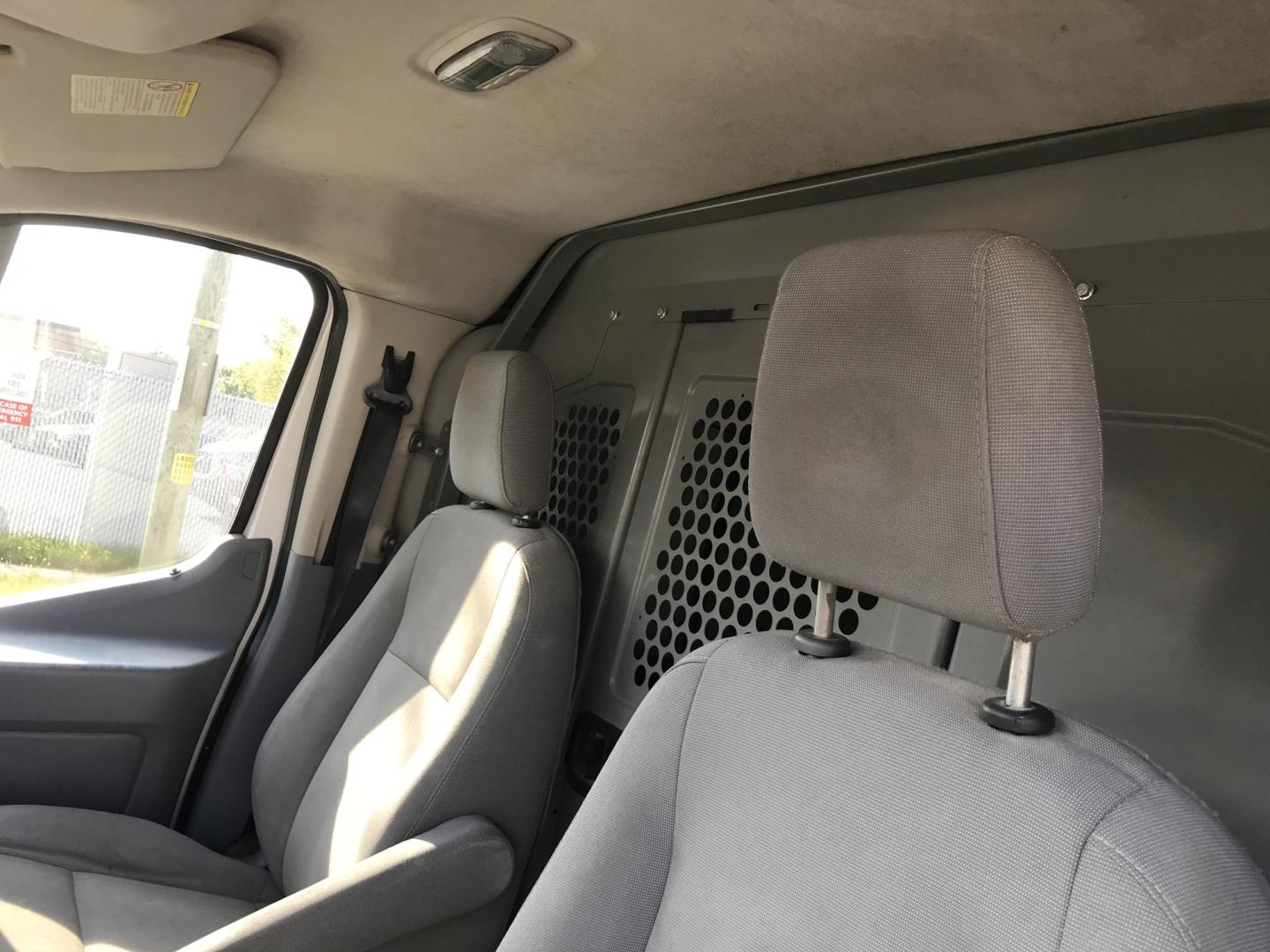 2015 White /Gray Ford Transit 150 Van Low Roof 60/40 Pass. 148-in. WB (1FTNE9ZM7FK) with an 3.7L V6 DOHC 24V engine, 6-Speed Automatic transmission, located at 577 Chester Pike, Prospect Park, PA, 19076, (610) 237-1015, 39.886154, -75.302338 - 15 Ford Transit 150: Ladder racks, multiple pieces of shelving, partition, brand new inspection, runs LIKE NEW! This vehicle comes inspected and has been given a bumper to bumper safety check. It is very clean, reliable, and well maintained. We offer a unique pay plan that is known for being the- Photo#10