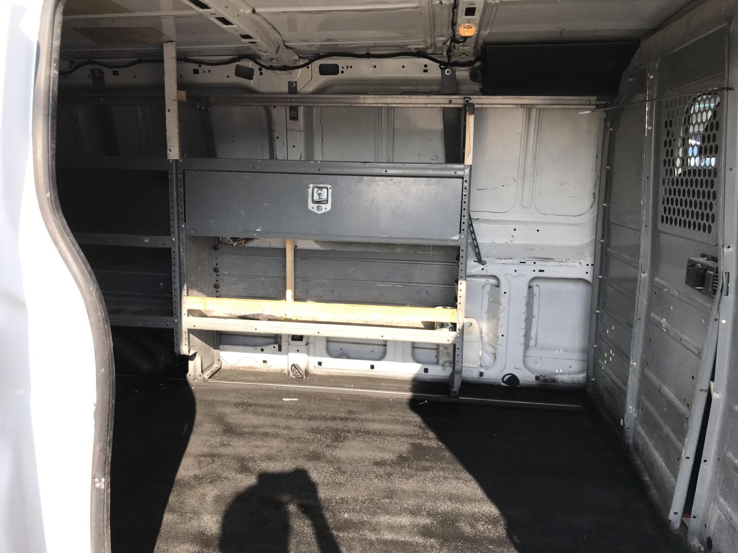 2015 White /Gray Ford Transit 150 Van Low Roof 60/40 Pass. 148-in. WB (1FTNE9ZM7FK) with an 3.7L V6 DOHC 24V engine, 6-Speed Automatic transmission, located at 577 Chester Pike, Prospect Park, PA, 19076, (610) 237-1015, 39.886154, -75.302338 - 15 Ford Transit 150: Ladder racks, multiple pieces of shelving, partition, brand new inspection, runs LIKE NEW! This vehicle comes inspected and has been given a bumper to bumper safety check. It is very clean, reliable, and well maintained. We offer a unique pay plan that is known for being the- Photo#17