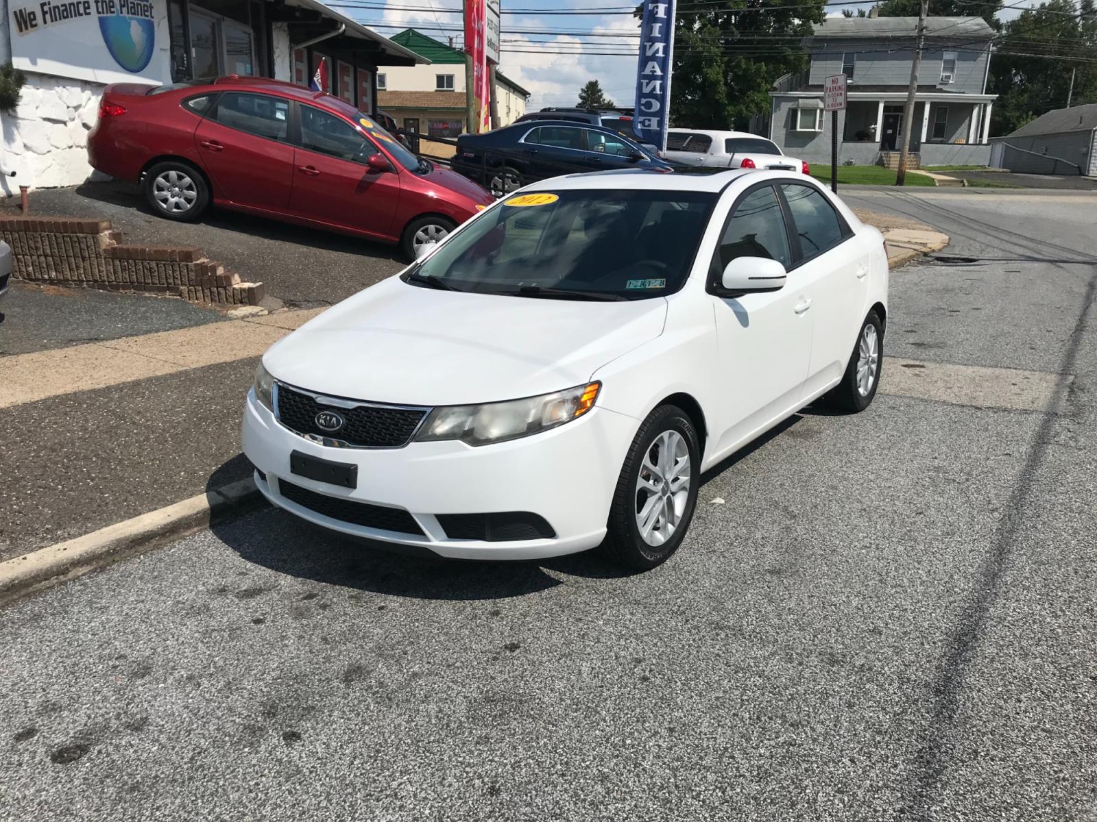 2012 White /Gray Kia Forte EX (KNAFU4A2XC5) with an 2.0L L4 DOHC 16V engine, Automatic transmission, located at 577 Chester Pike, Prospect Park, PA, 19076, (610) 237-1015, 39.886154, -75.302338 - Photo #2