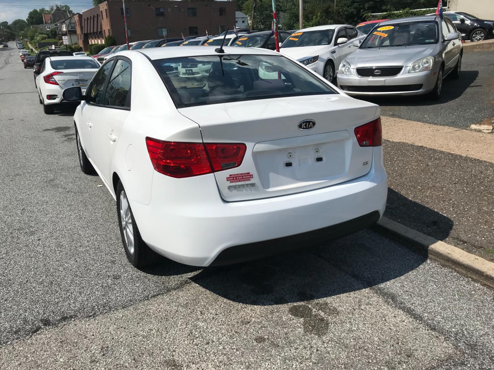 2012 White /Gray Kia Forte EX (KNAFU4A2XC5) with an 2.0L L4 DOHC 16V engine, Automatic transmission, located at 577 Chester Pike, Prospect Park, PA, 19076, (610) 237-1015, 39.886154, -75.302338 - Photo #5
