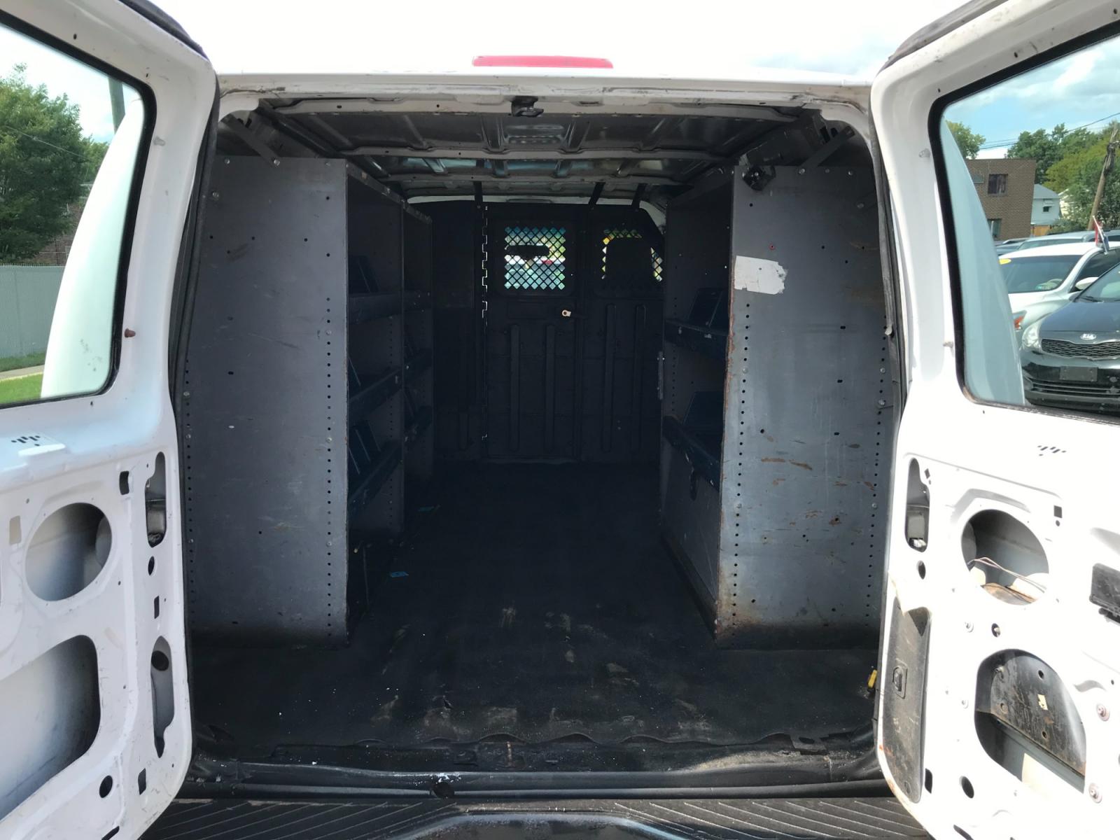 2011 White /Gray Ford E-Series Van E-150 (1FTNE1EW4BD) with an 4.6L V8 SOHC 16V engine, 4-Speed Automatic transmission, located at 577 Chester Pike, Prospect Park, PA, 19076, (610) 237-1015, 39.886154, -75.302338 - Photo #15