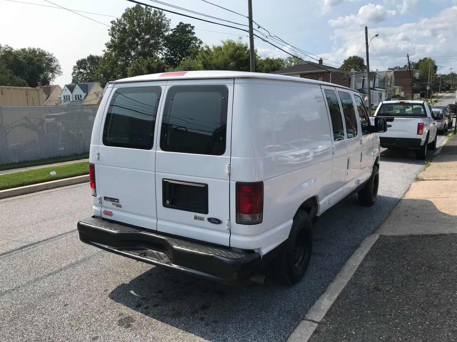 2011 White /Gray Ford E-Series Van E-150 (1FTNE1EW4BD) with an 4.6L V8 SOHC 16V engine, 4-Speed Automatic transmission, located at 577 Chester Pike, Prospect Park, PA, 19076, (610) 237-1015, 39.886154, -75.302338 - Photo #3