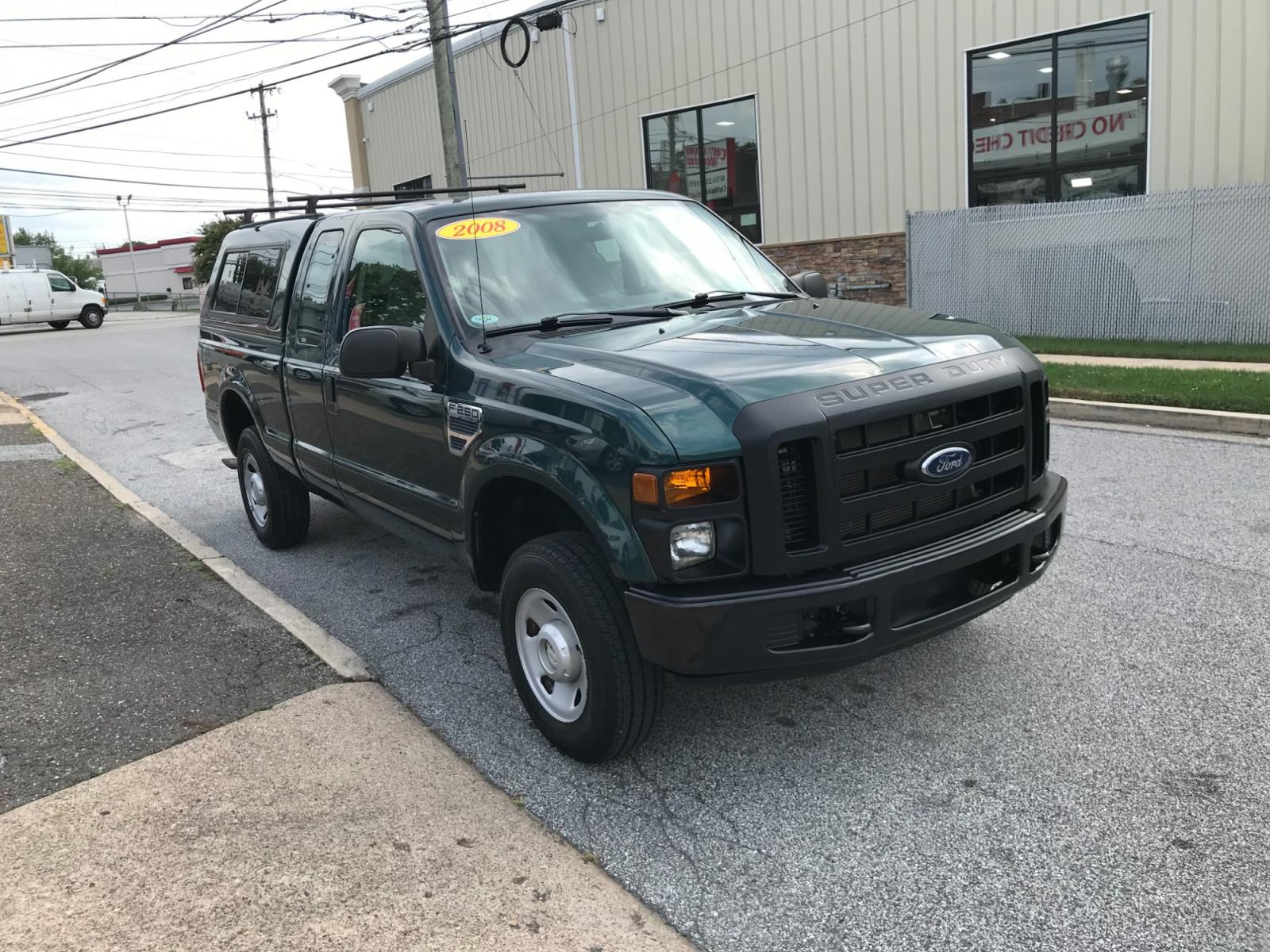 2008 Green /Tan Ford F-250 SD Super Duty SuperCab (1FTSX21528E) with an 5.4L V8 SOHC 16V engine, Automatic transmission, located at 577 Chester Pike, Prospect Park, PA, 19076, (610) 237-1015, 39.886154, -75.302338 - 08 Ford F250 Super Duty: Only 53k miles, extended cab, 4x4, trailer hitch, ladder racks, 8/24 PA inspection, looks and runs LIKE NEW! This vehicle comes inspected and has been given a bumper to bumper safety check. It is very clean, reliable, and well maintained. We offer a unique pay plan that i - Photo #3