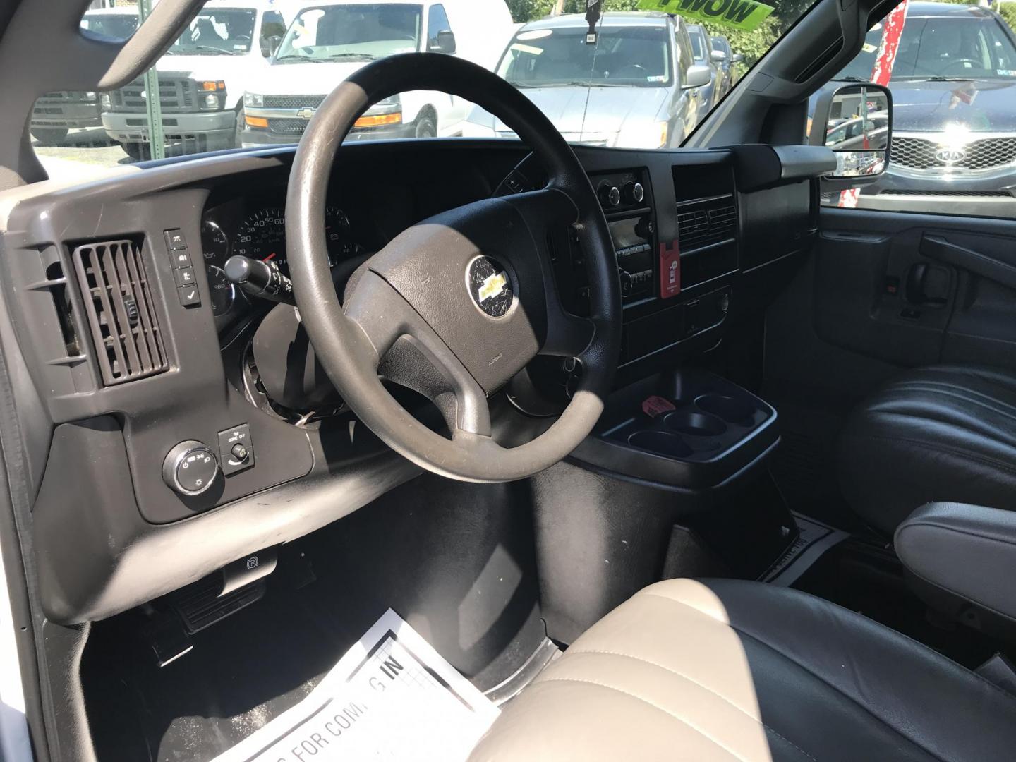 2017 White /Gray Chevrolet Express 2500 Cargo (1GCWGAFF2H1) with an 4.8L V8 FFV engine, 6A transmission, located at 577 Chester Pike, Prospect Park, PA, 19076, (610) 237-1015, 39.886154, -75.302338 - 17 Chevy Express 2500 Cargo Van: power locks and windows, partition, new PA inspection, FLEET SERVICED VAN, runs LIKE NEW! This vehicle comes inspected and has been given a bumper to bumper safety check. It is very clean, reliable, and well maintained. We offer a unique pay plan that is known for - Photo#11