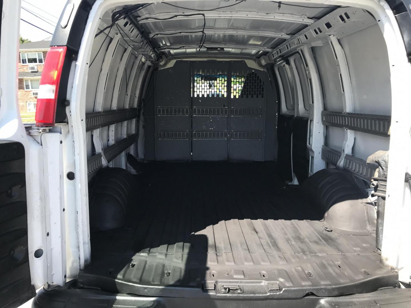 2017 White /Gray Chevrolet Express 2500 Cargo (1GCWGAFF2H1) with an 4.8L V8 FFV engine, 6A transmission, located at 577 Chester Pike, Prospect Park, PA, 19076, (610) 237-1015, 39.886154, -75.302338 - 17 Chevy Express 2500 Cargo Van: power locks and windows, partition, new PA inspection, FLEET SERVICED VAN, runs LIKE NEW! This vehicle comes inspected and has been given a bumper to bumper safety check. It is very clean, reliable, and well maintained. We offer a unique pay plan that is known for - Photo#14