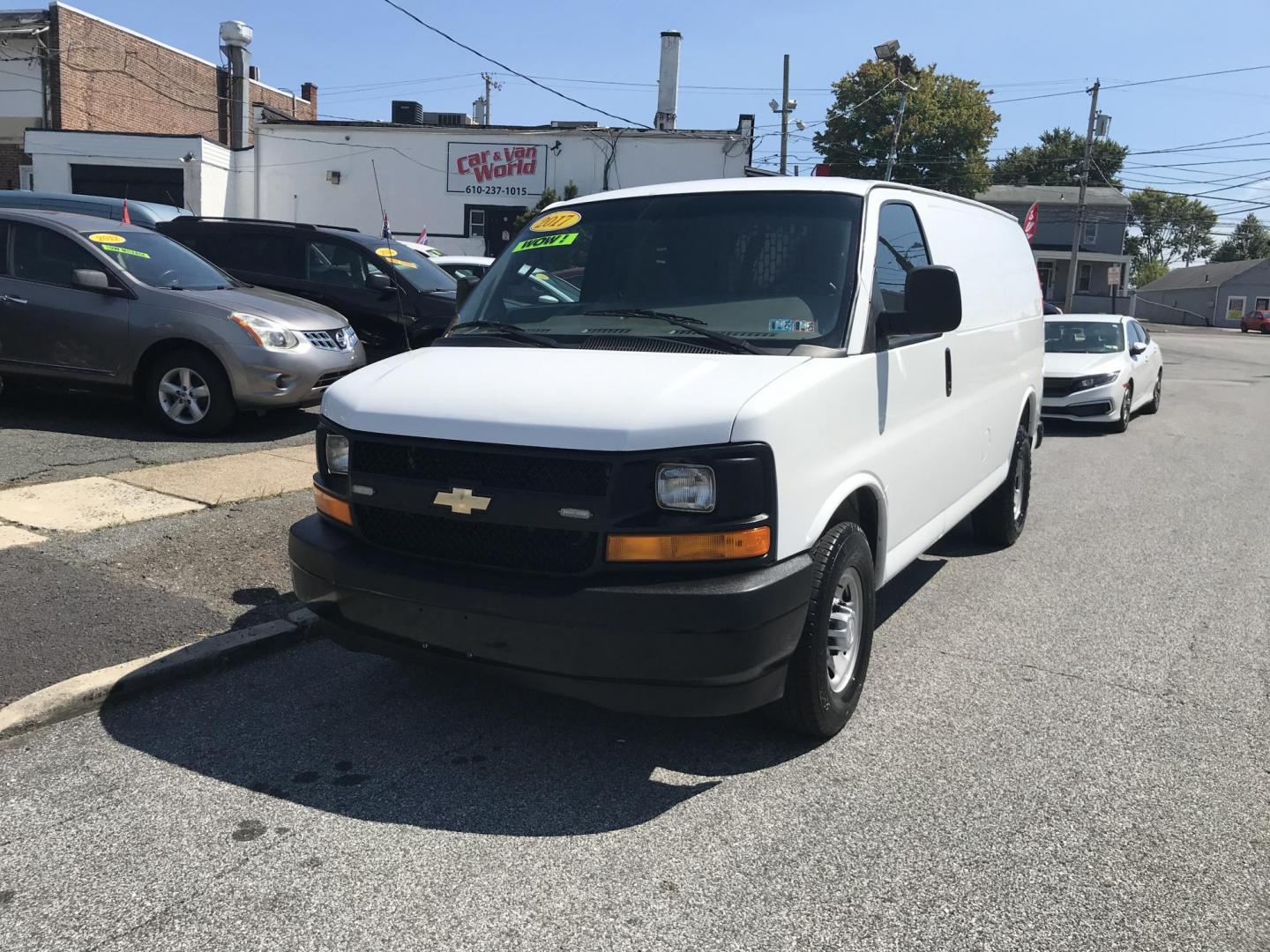 2017 White /Gray Chevrolet Express 2500 Cargo (1GCWGAFF2H1) with an 4.8L V8 FFV engine, 6A transmission, located at 577 Chester Pike, Prospect Park, PA, 19076, (610) 237-1015, 39.886154, -75.302338 - 17 Chevy Express 2500 Cargo Van: power locks and windows, partition, new PA inspection, FLEET SERVICED VAN, runs LIKE NEW! This vehicle comes inspected and has been given a bumper to bumper safety check. It is very clean, reliable, and well maintained. We offer a unique pay plan that is known for - Photo#2