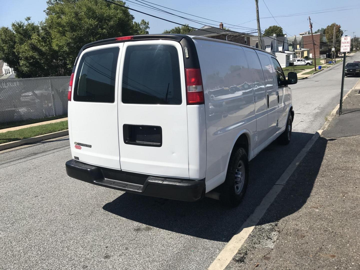 2017 White /Gray Chevrolet Express 2500 Cargo (1GCWGAFF2H1) with an 4.8L V8 FFV engine, 6A transmission, located at 577 Chester Pike, Prospect Park, PA, 19076, (610) 237-1015, 39.886154, -75.302338 - 17 Chevy Express 2500 Cargo Van: power locks and windows, partition, new PA inspection, FLEET SERVICED VAN, runs LIKE NEW! This vehicle comes inspected and has been given a bumper to bumper safety check. It is very clean, reliable, and well maintained. We offer a unique pay plan that is known for - Photo#5